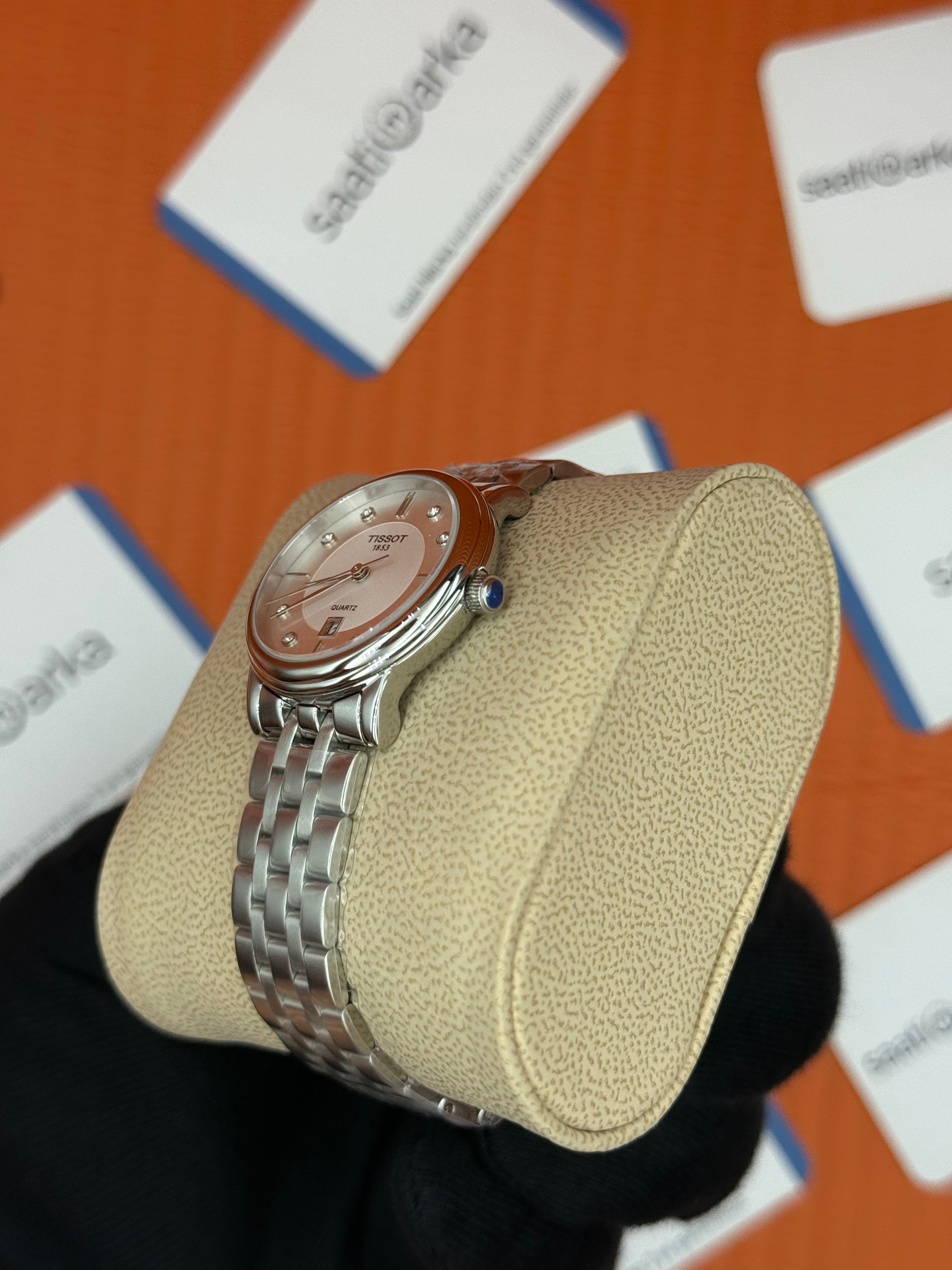 TISSOT beyaz baget taşllı kadran silver kasa kordon kadın kol saati