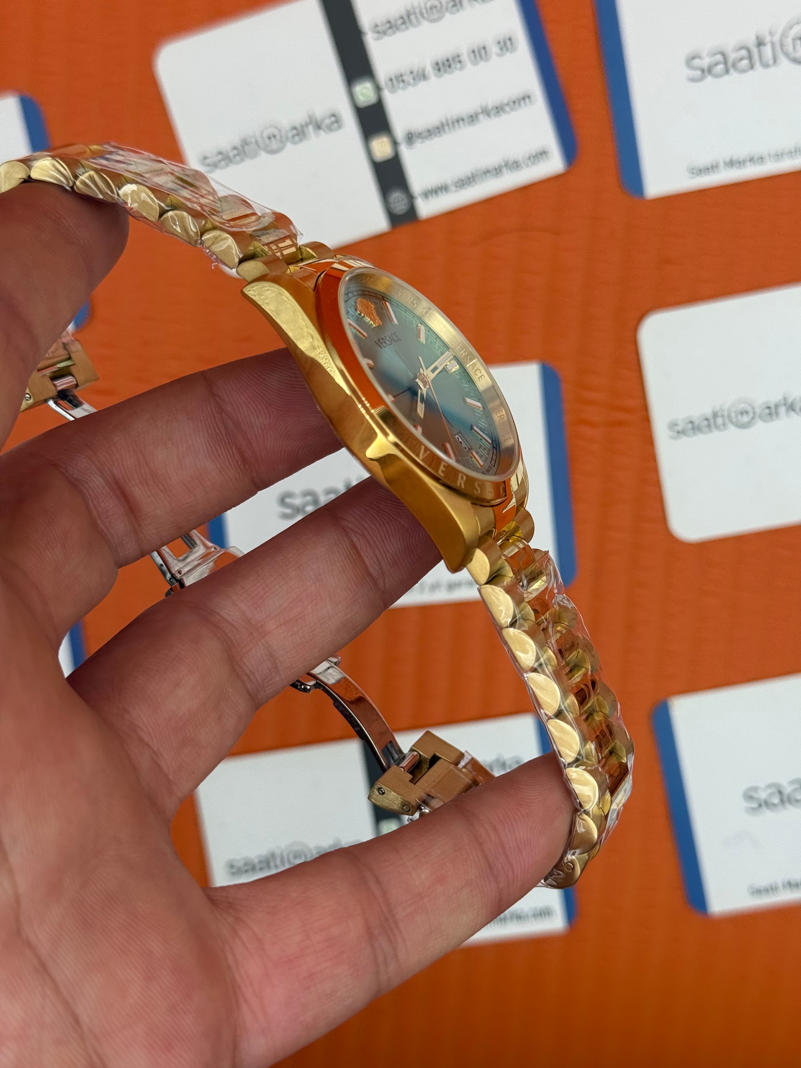 VERSACE 40mm turkuaz kadran gold kasa kordon erkek kol saati