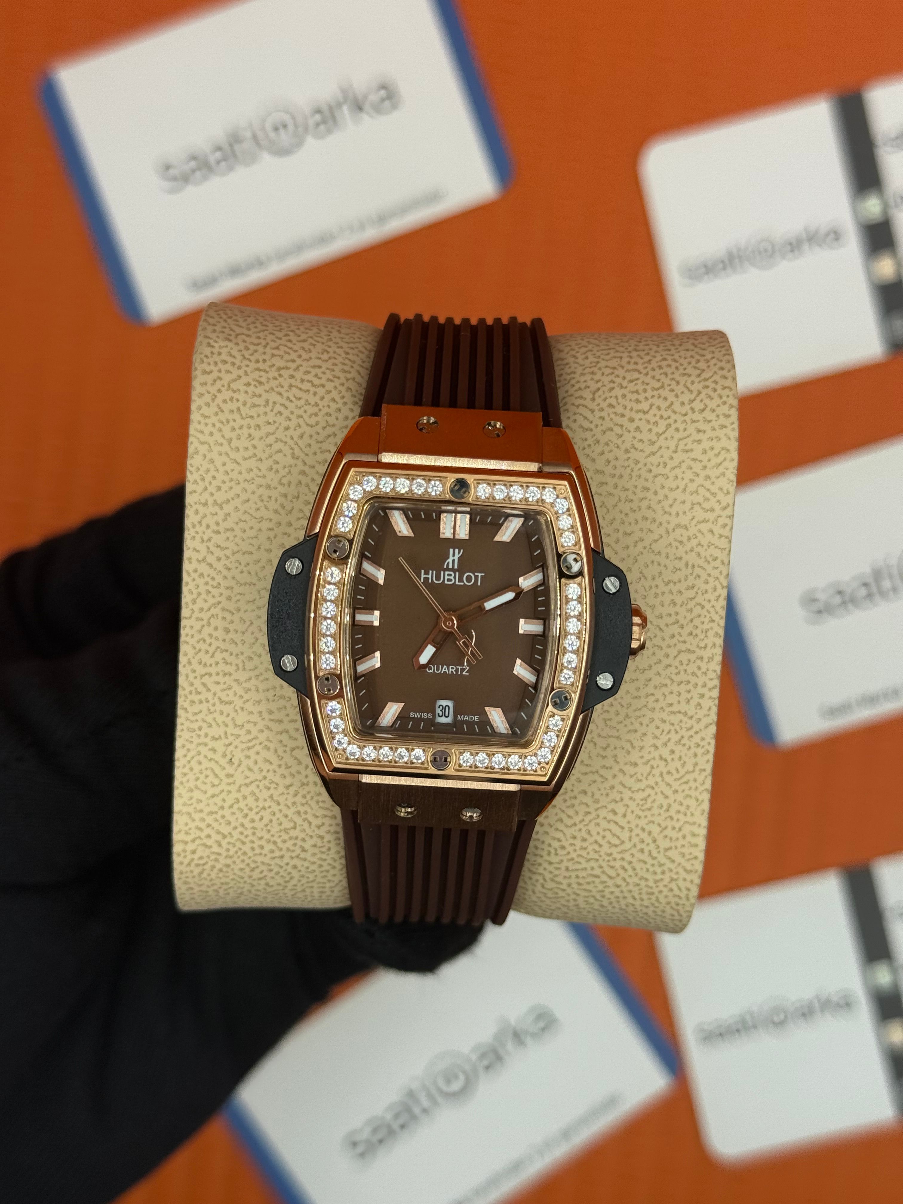 HUBLOT taşlı bezel rose kasa kahverengi kadran kahverengi kauçuk kordon kadın kol saati