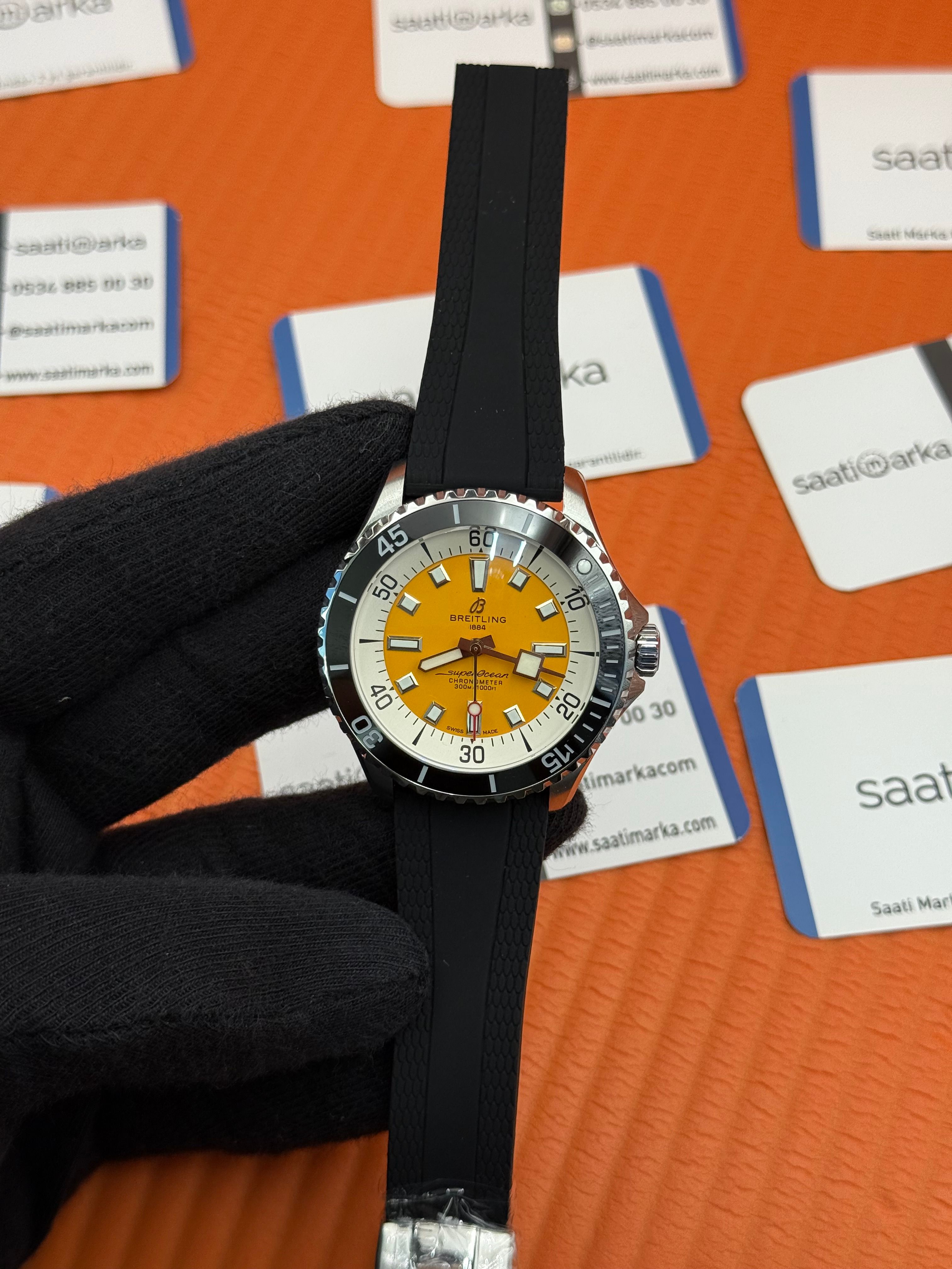 ROLEX Superocean siyah kauçuk kordon sarı kadran