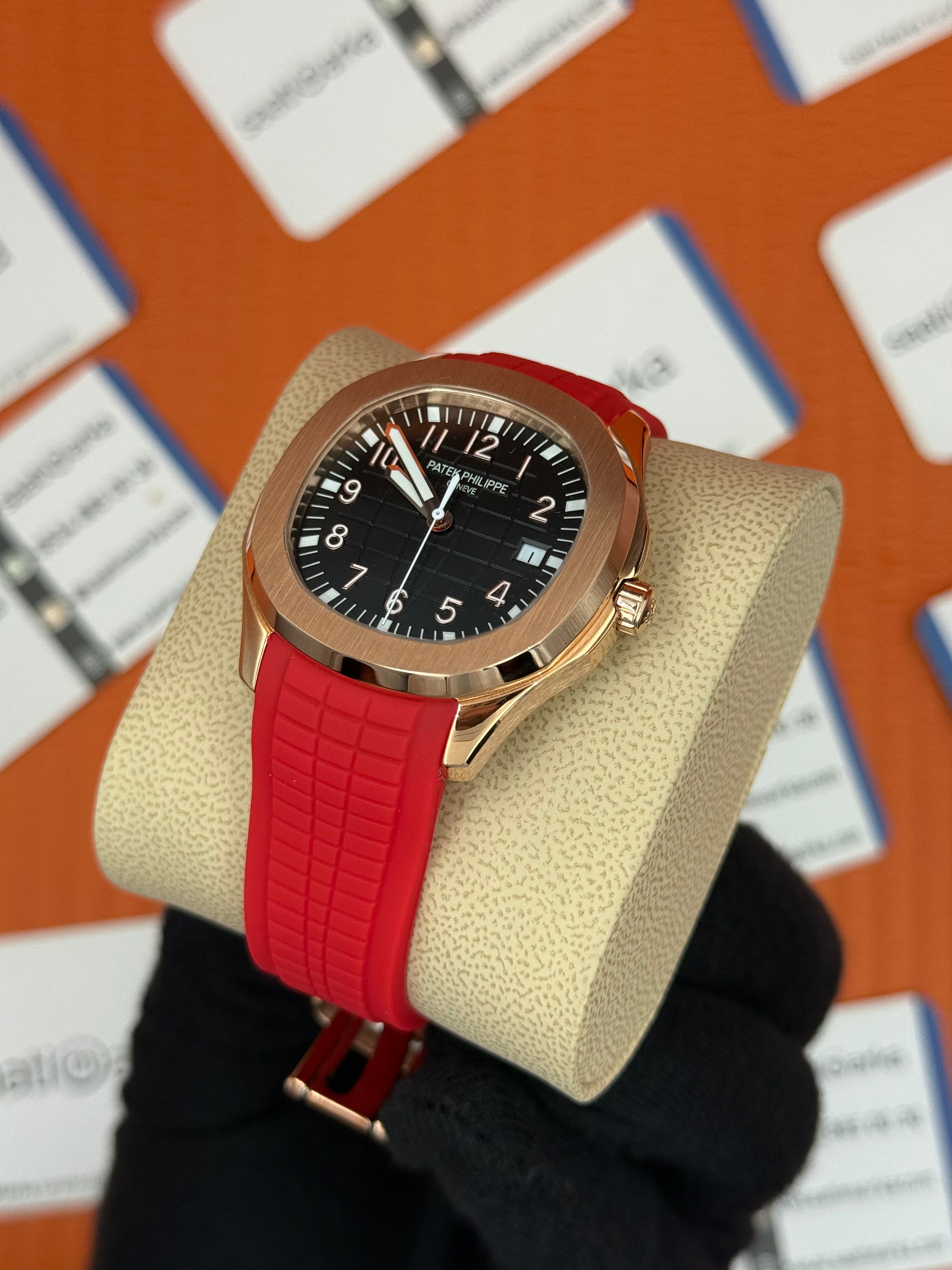 PATEK PHILIPPE AQUANAUT SİYAH KADRAN KIRMIZI KAUÇUK KORDON ROSE KASA 