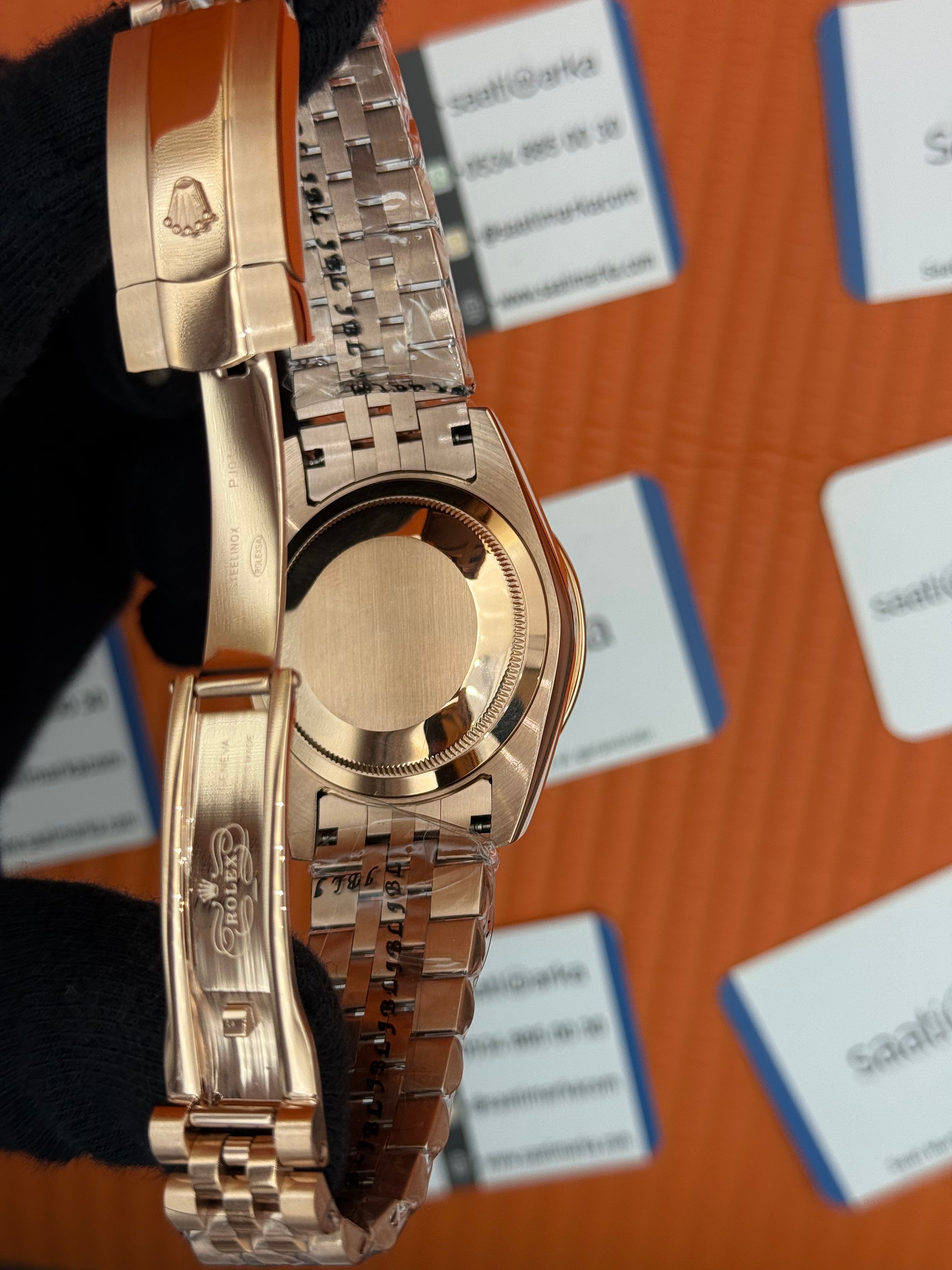 ROLEX Day Date taşlı bezel  roma rakamlı yeşil kadran rose kasa-kordon jubilee