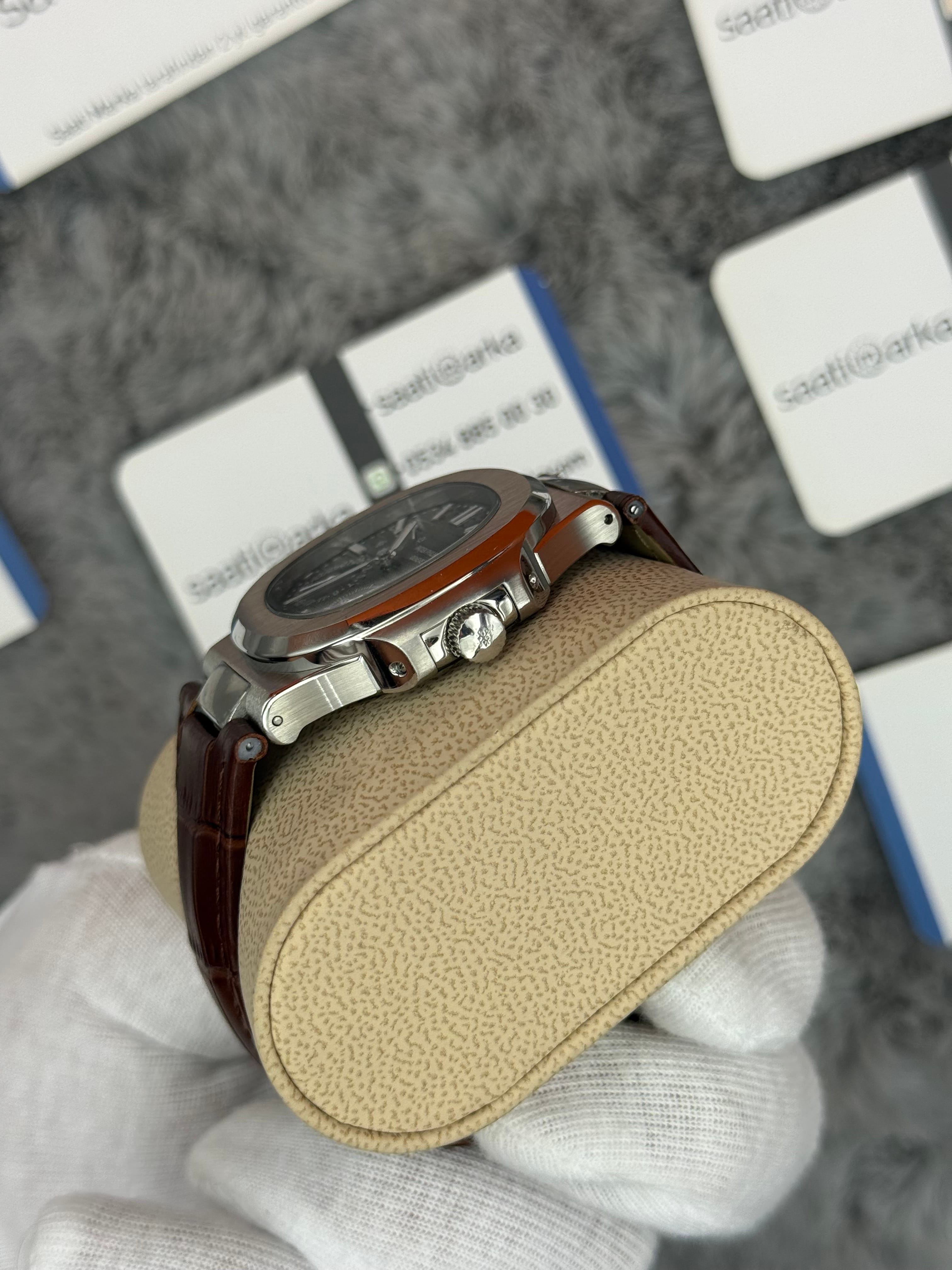 PATEK PHİLİPPE nautilus moontphase 5712 gri kadran kahverengi deri kordon silver kasa 40mm erkek kol saati