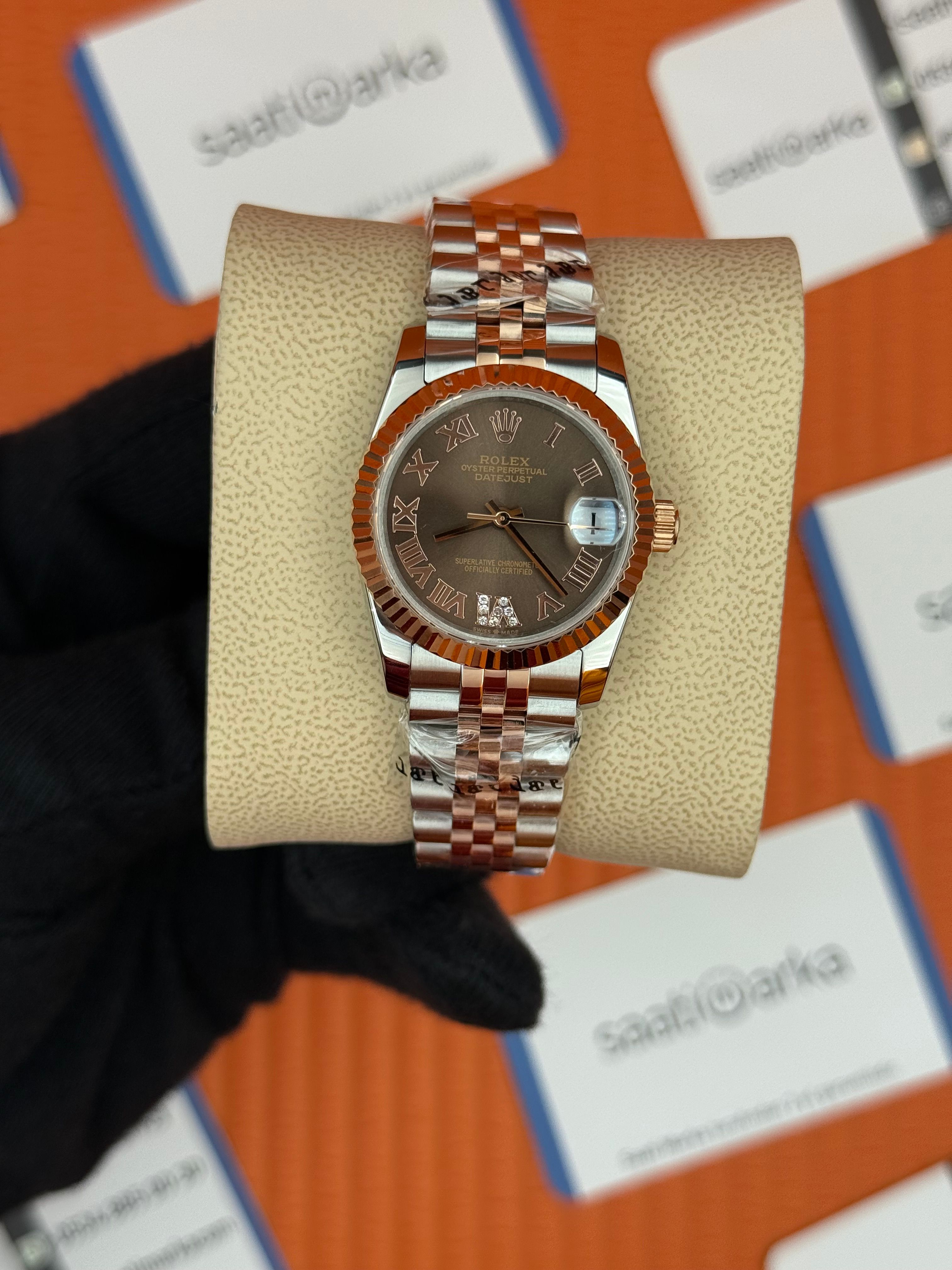 ROLEX datejust 31mm kahverengi roma rakamlı kadran rose silver jubilee kordon