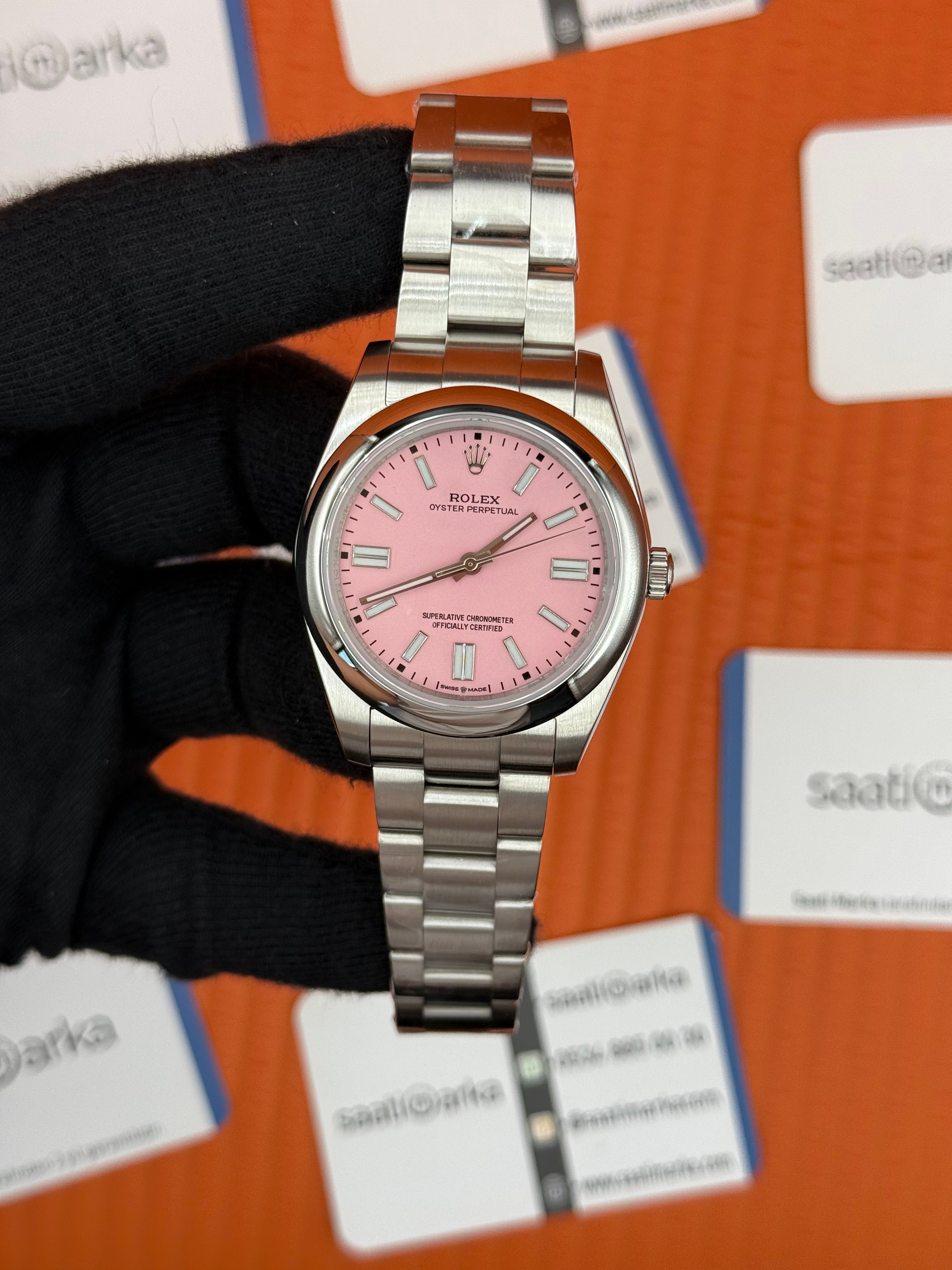 ROLEX OYSTER Perpetual pink dial silver kasa-kordon