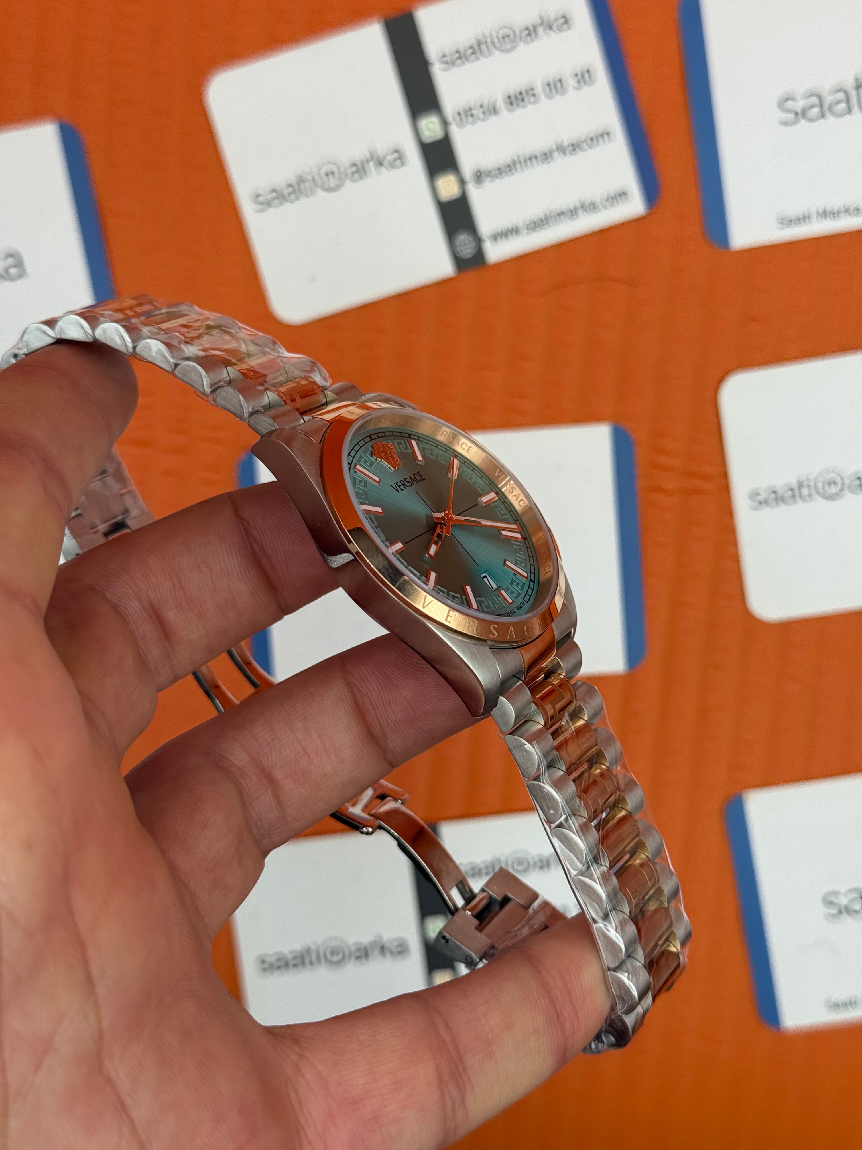 VERSACE 40mm turkuaz kadran rose silver kasa kordon erkek kol saati