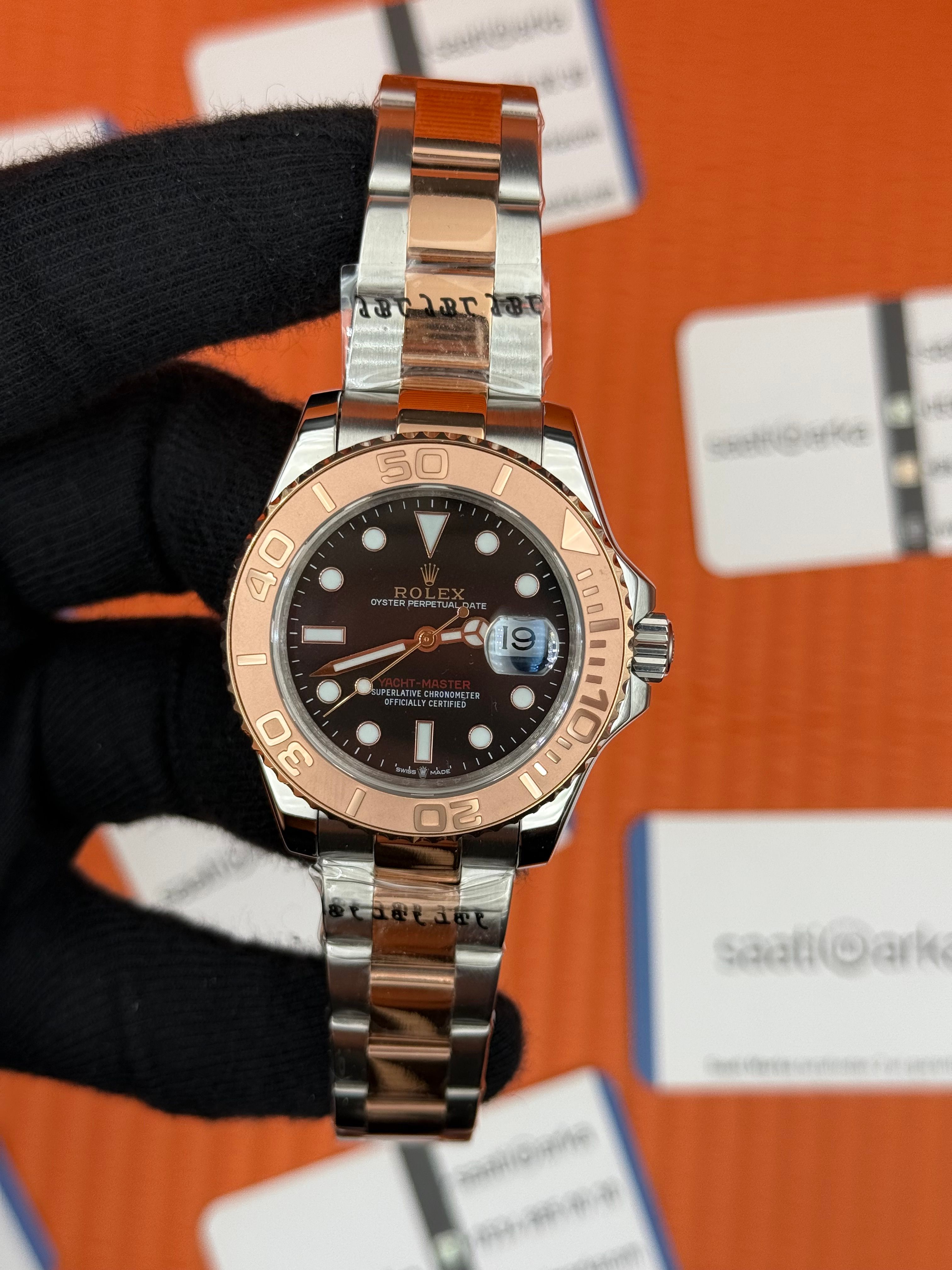 ROLEX Yacht Master oyster black dial rose silver kordon