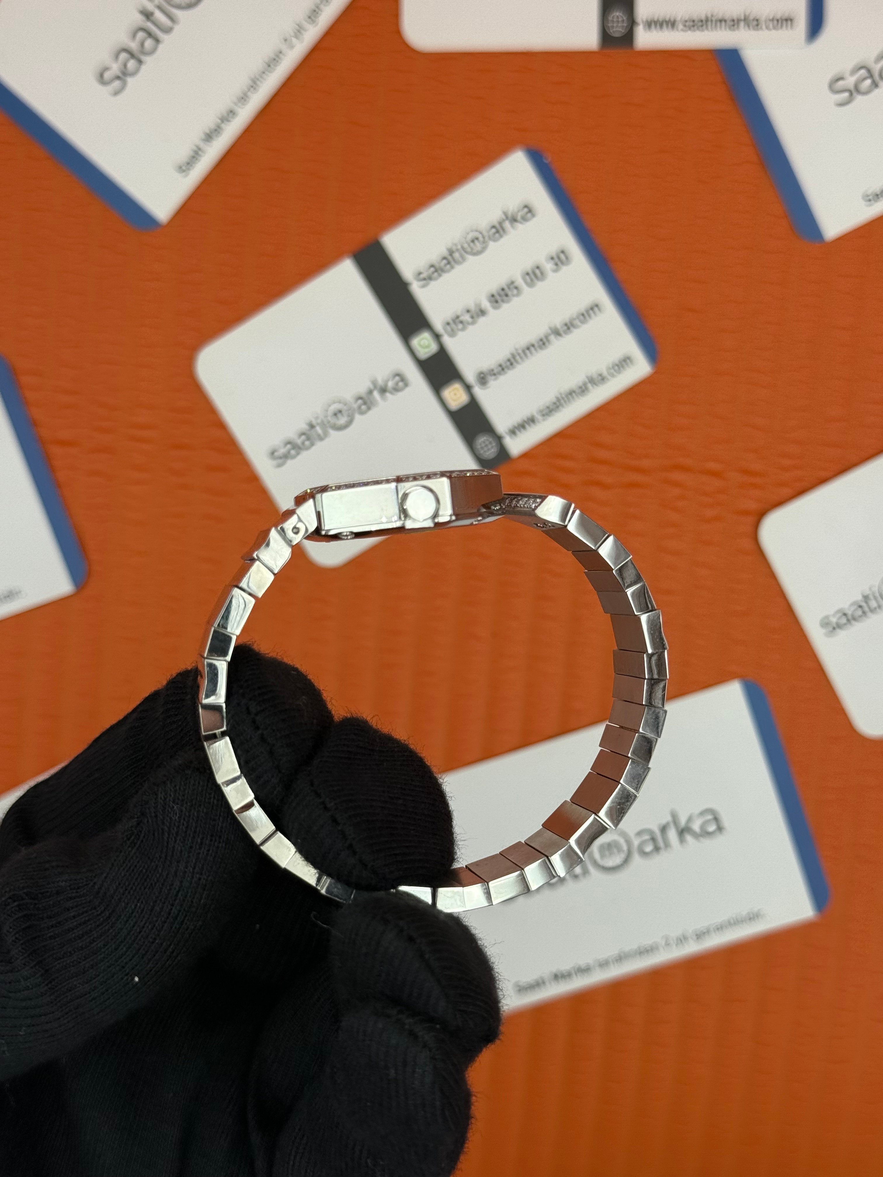 DİOR beyaz kadran taşı bezel silver kasa kordon kadın kol saati