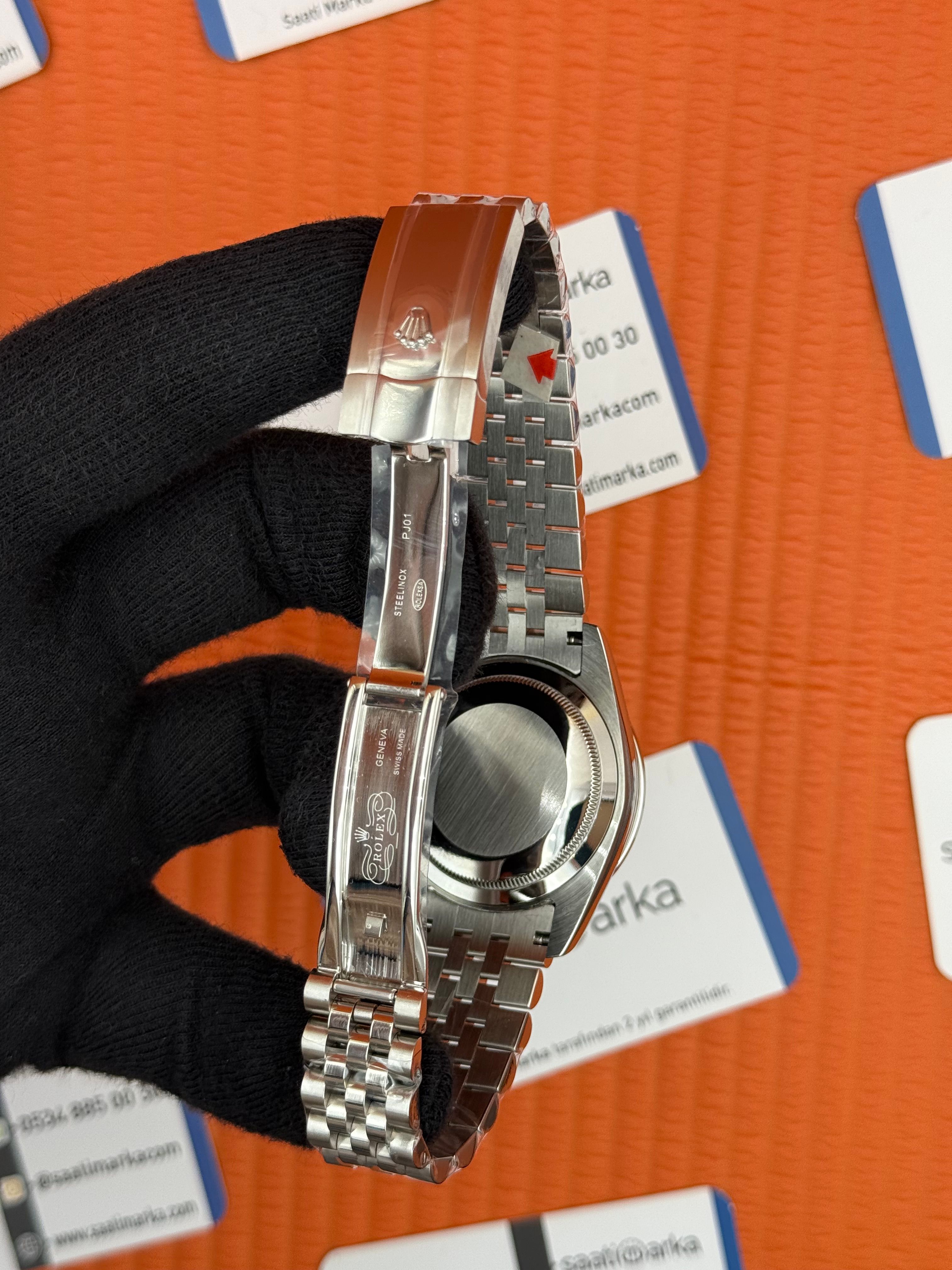 ROLEX Day Date taşlı bezel turkuaz noktalı kadran jubilee kordon