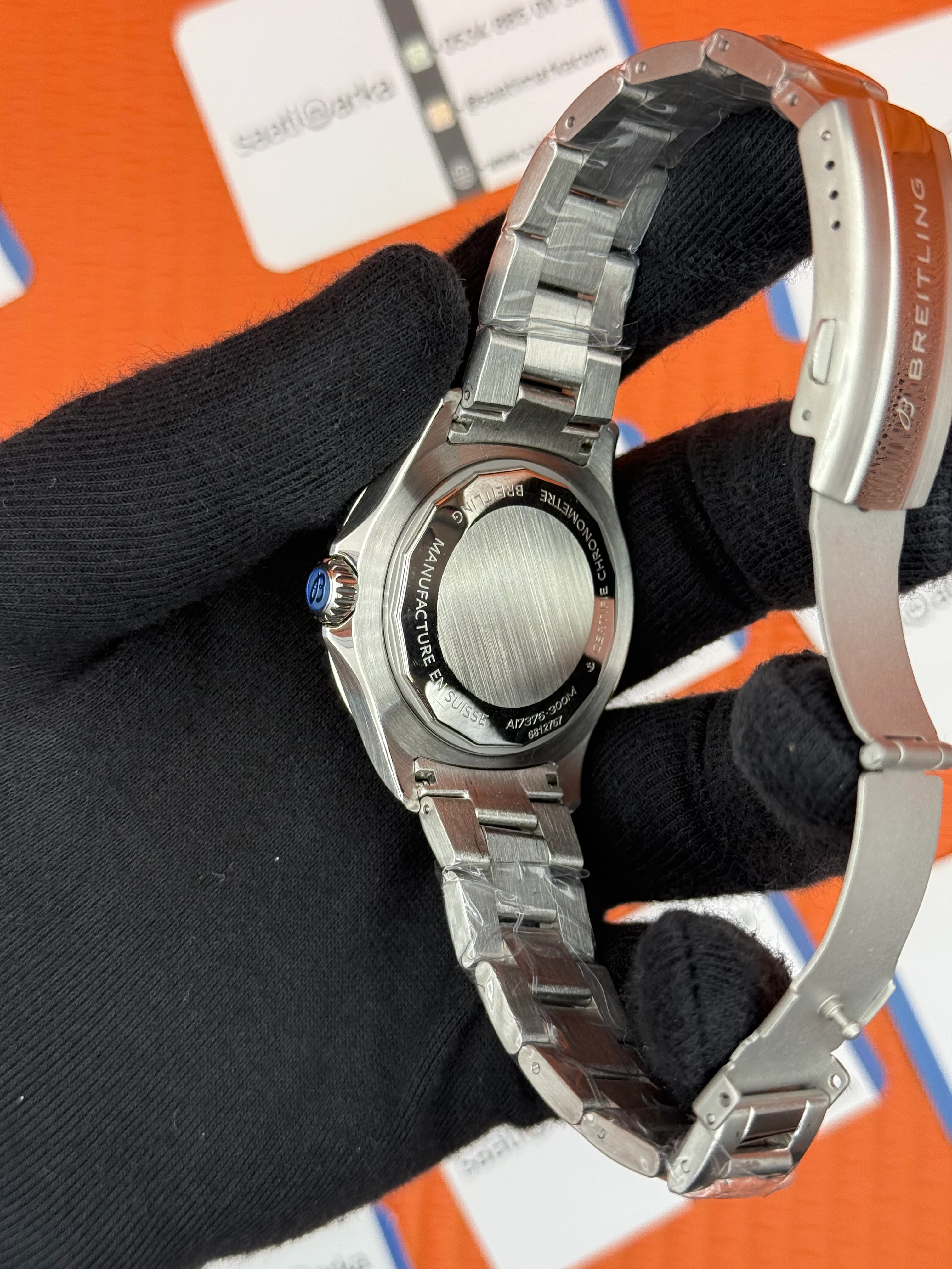 BREITLING Superocean çelik kasa kordon turuncu kadran