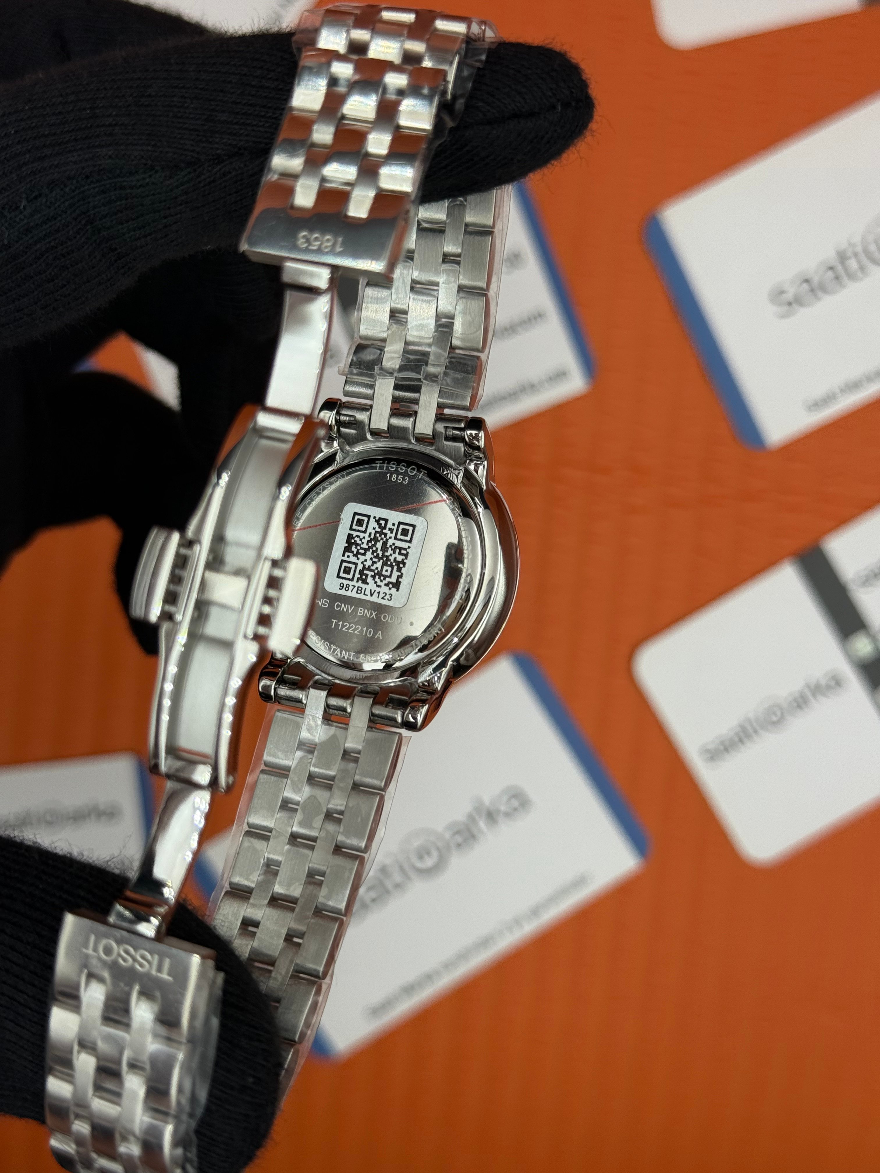 TISSOT beyaz baget taşllı kadran silver kasa kordon kadın kol saati