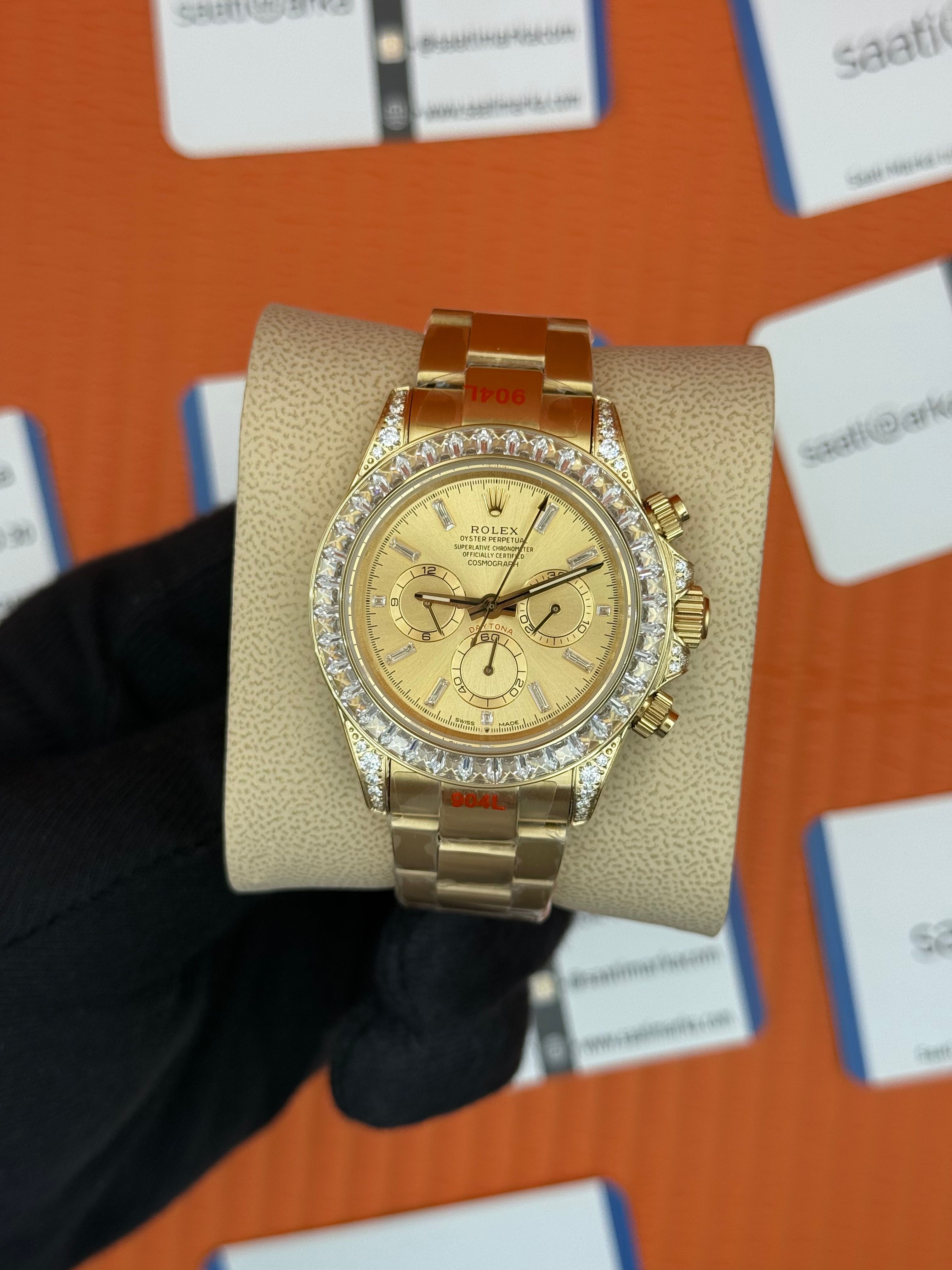 ROLEX Daytona taşlı bezel champagne dial gold kasa-kordon