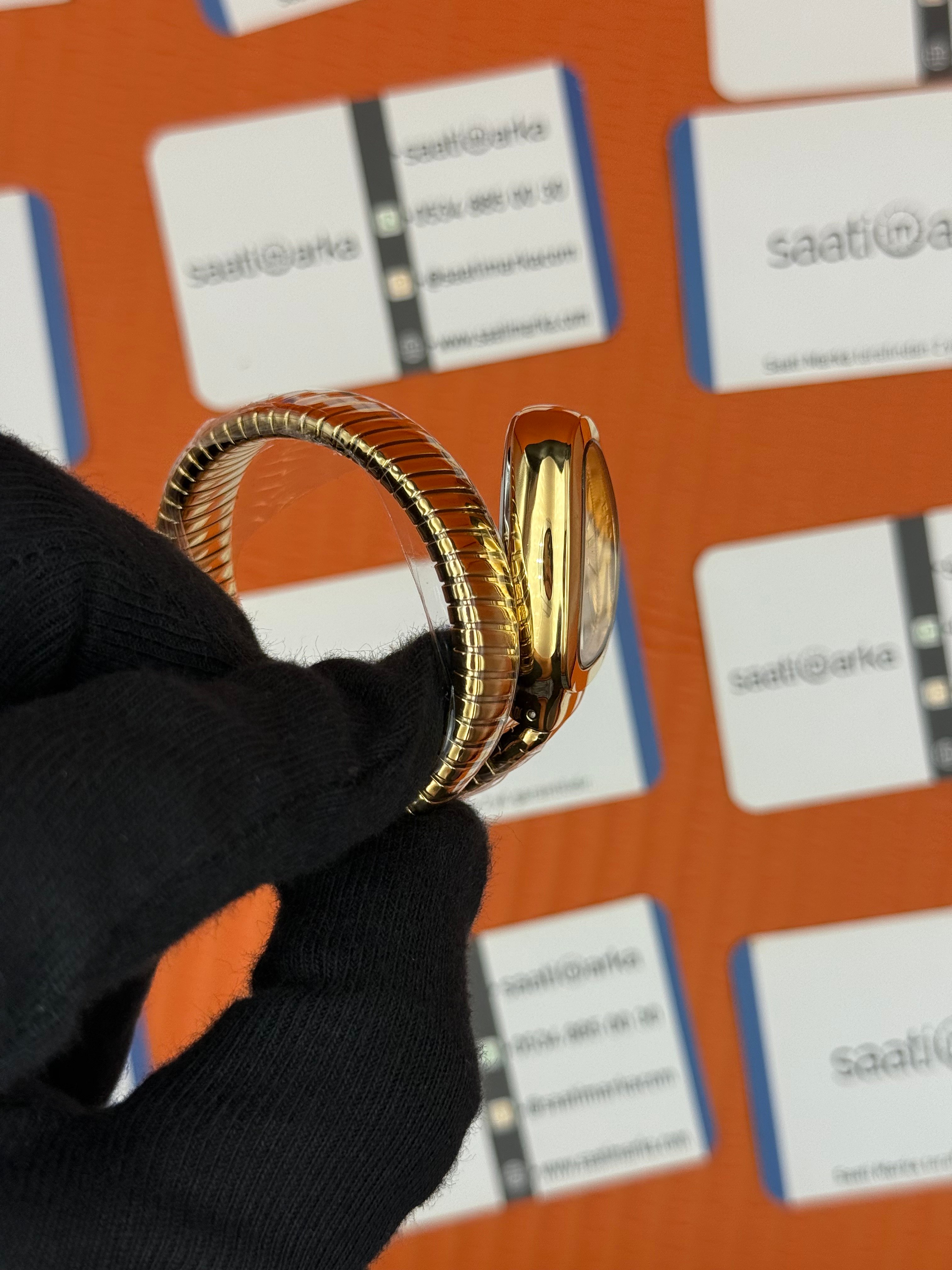 BVLGARİ serpenti tek sarma gold kordon şampanya kadran kol saati