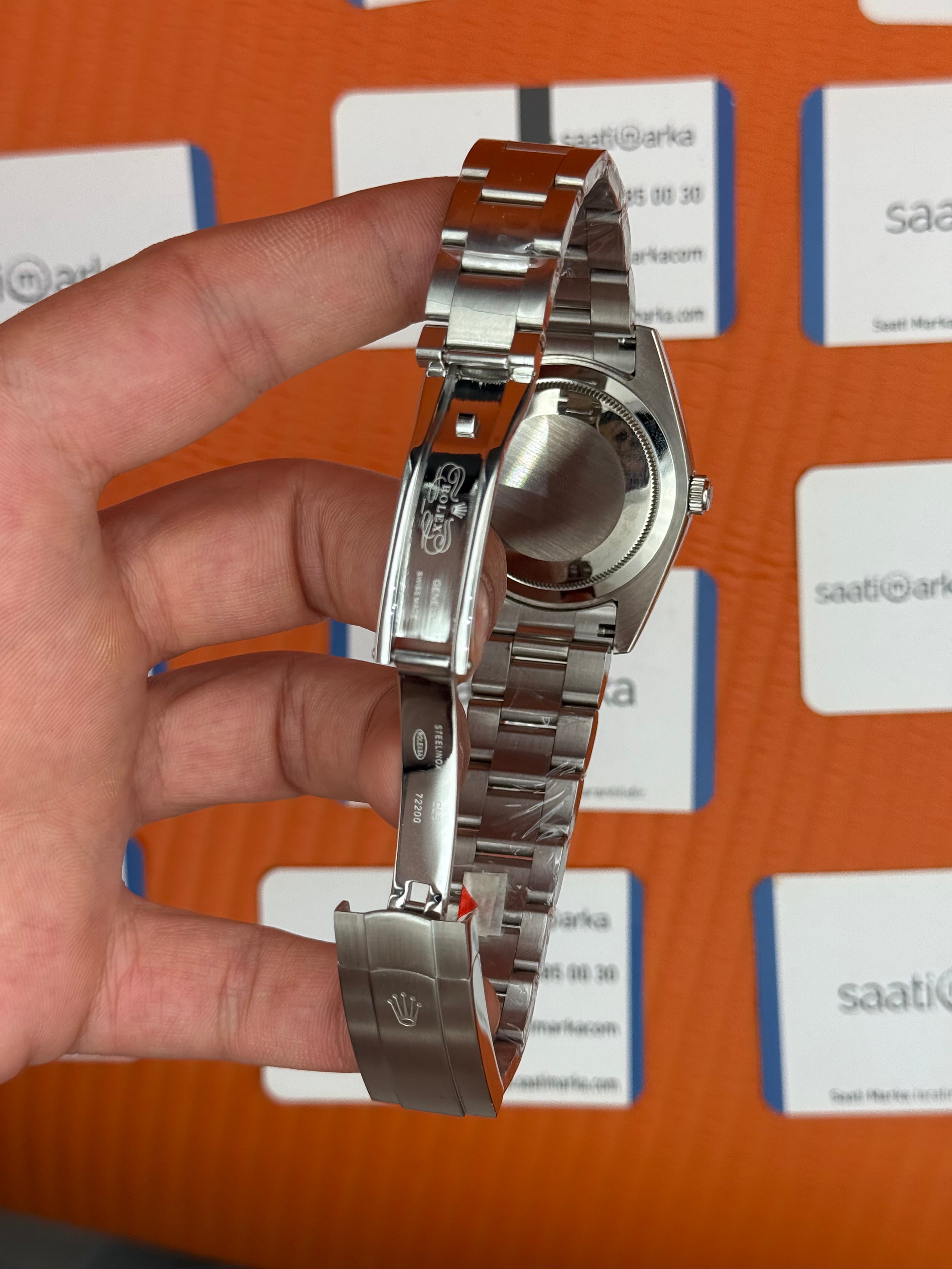 ROLEX oyster perpetual şampanya kadran silver kasa kordon erkek kol saati
