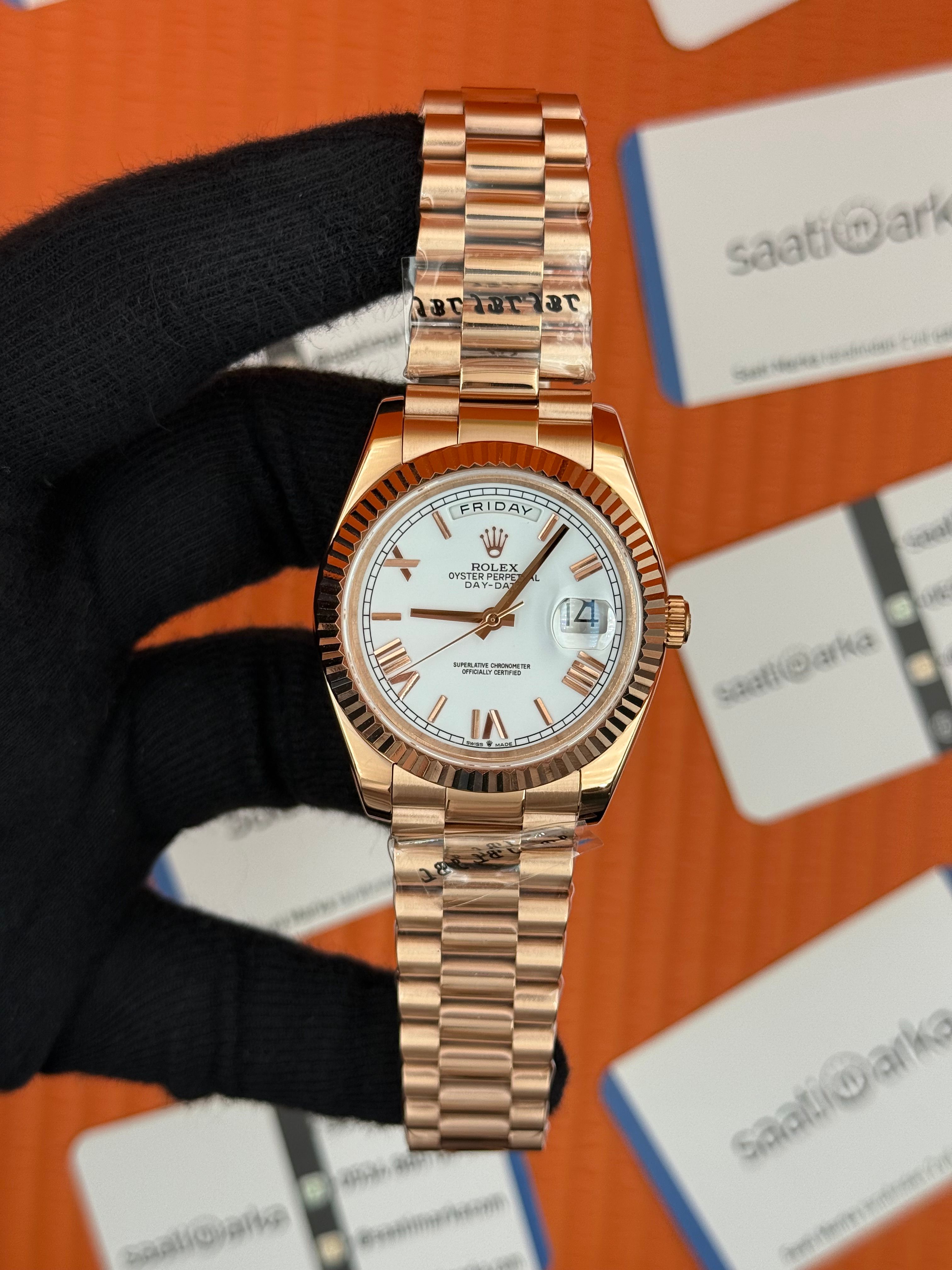 ROLEX Day Date roma rakamlı beyaz kadran rose kasa-kordon oyster