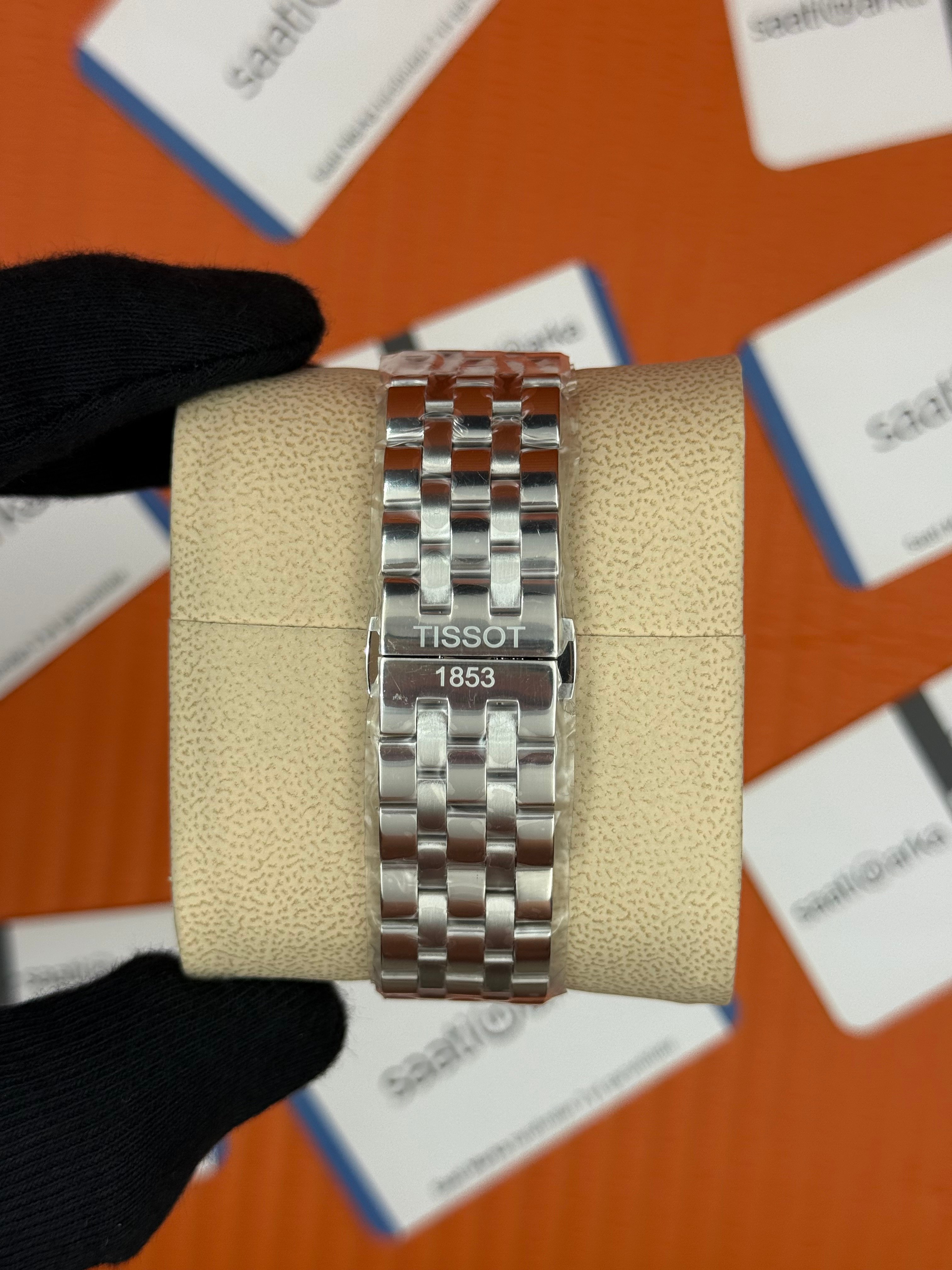 TISSOT carson premium gent moonphase beyaz kadran silver jubile kordon erkek kol saati