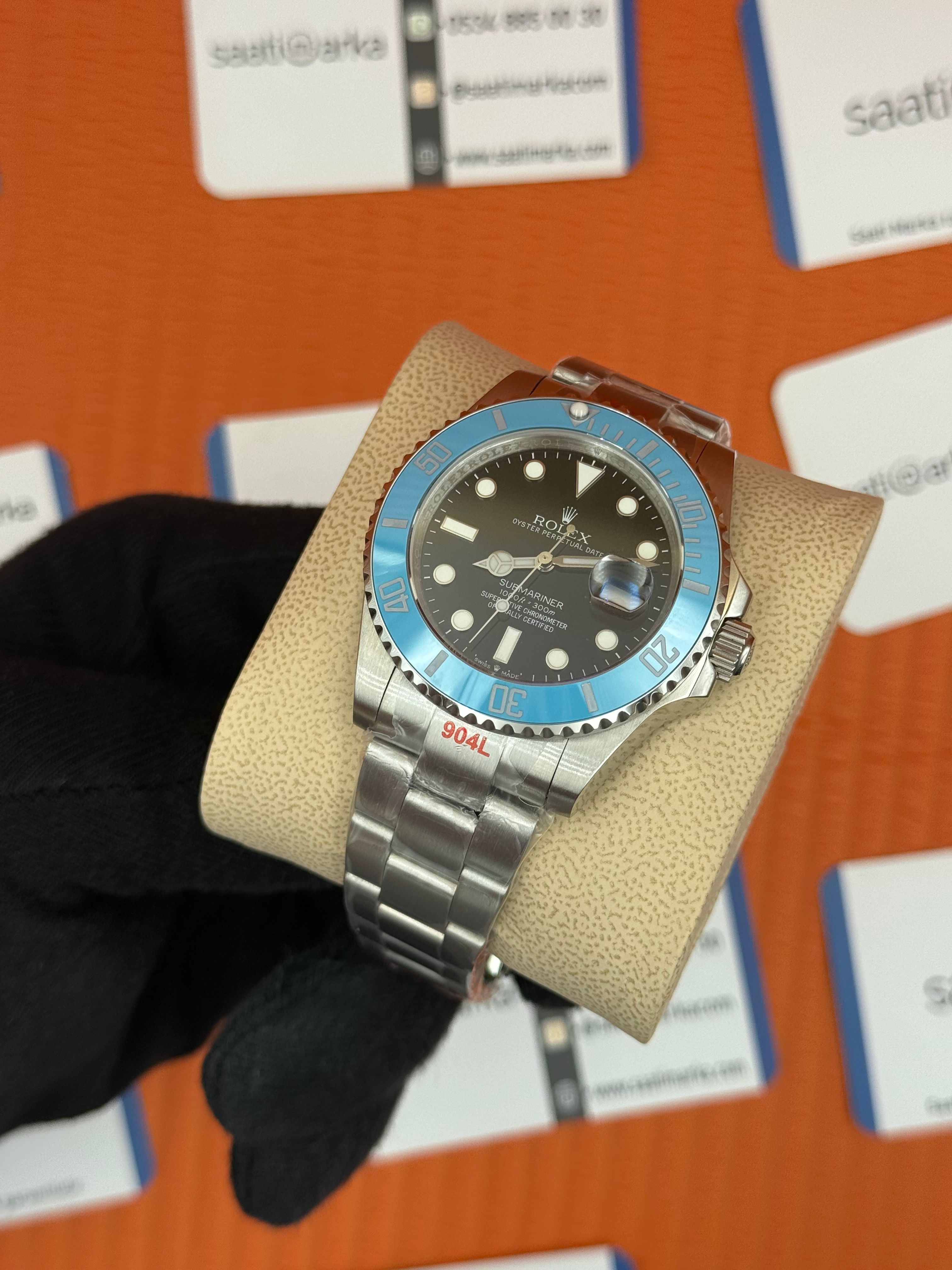 ROLEX Submariner black dial turquoise bezel silver oyster kordon
