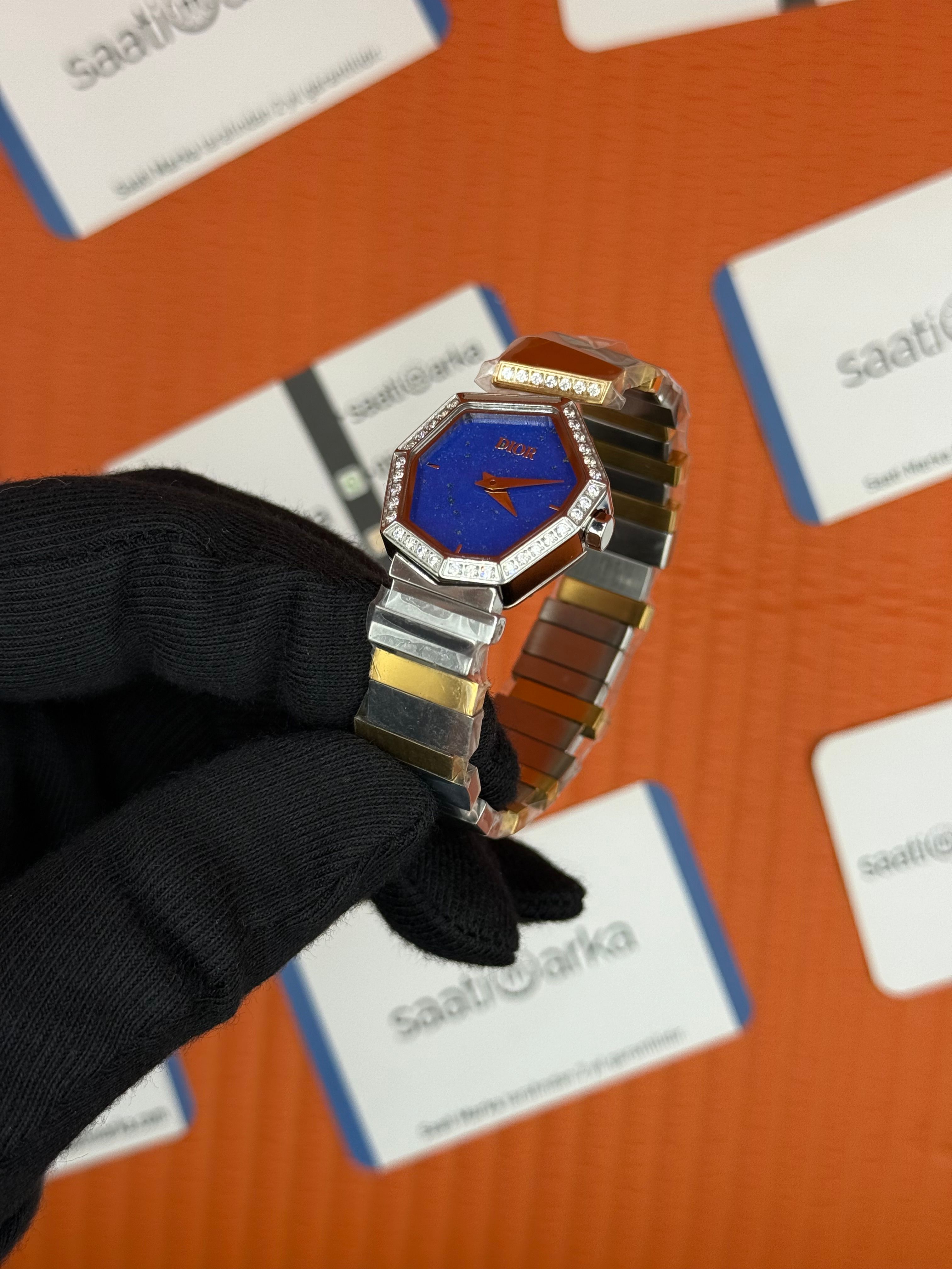 DİOR taşlı bezel mavi kadran gold silver kordon kadın kol saati