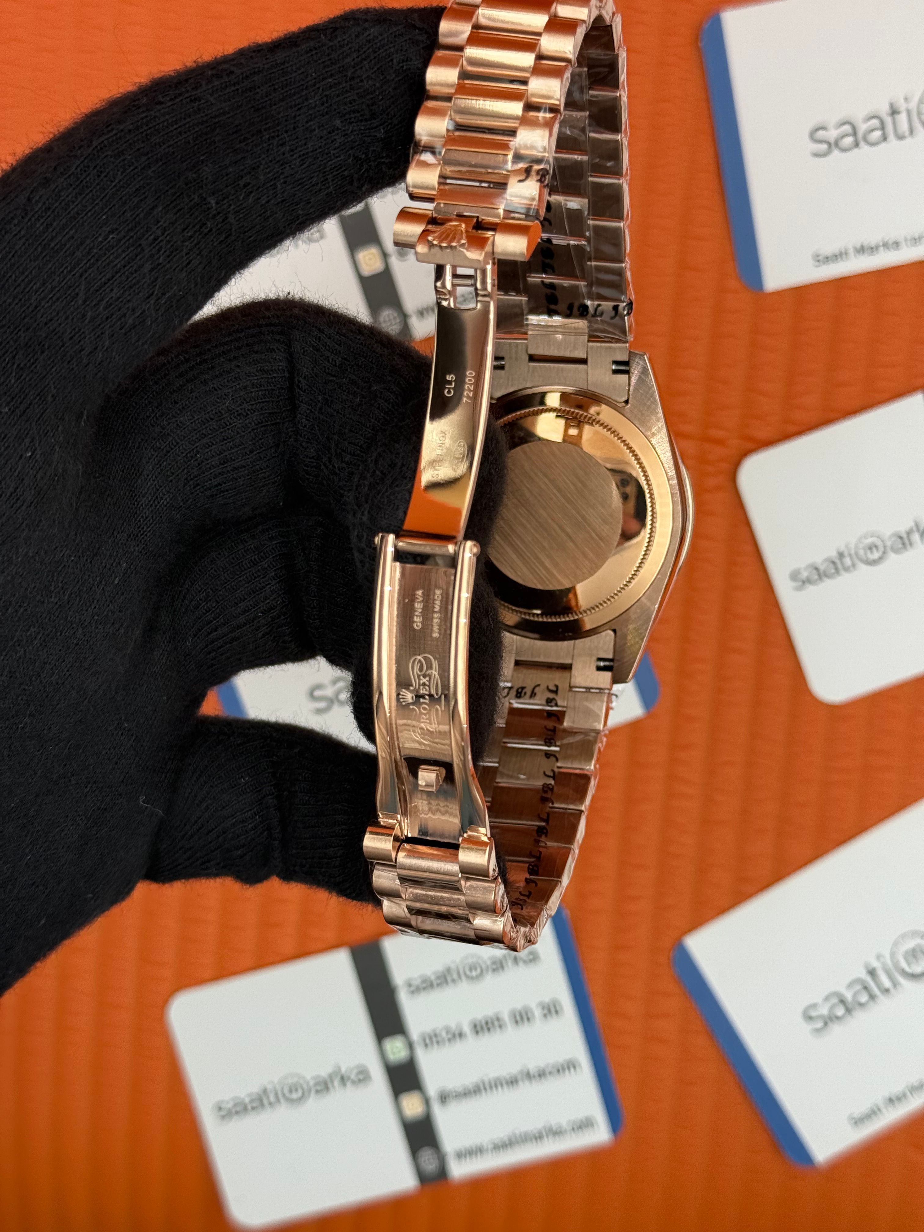 ROLEX Dsay Date taşlı bezel rose kadran rose kasa-kordon oyster