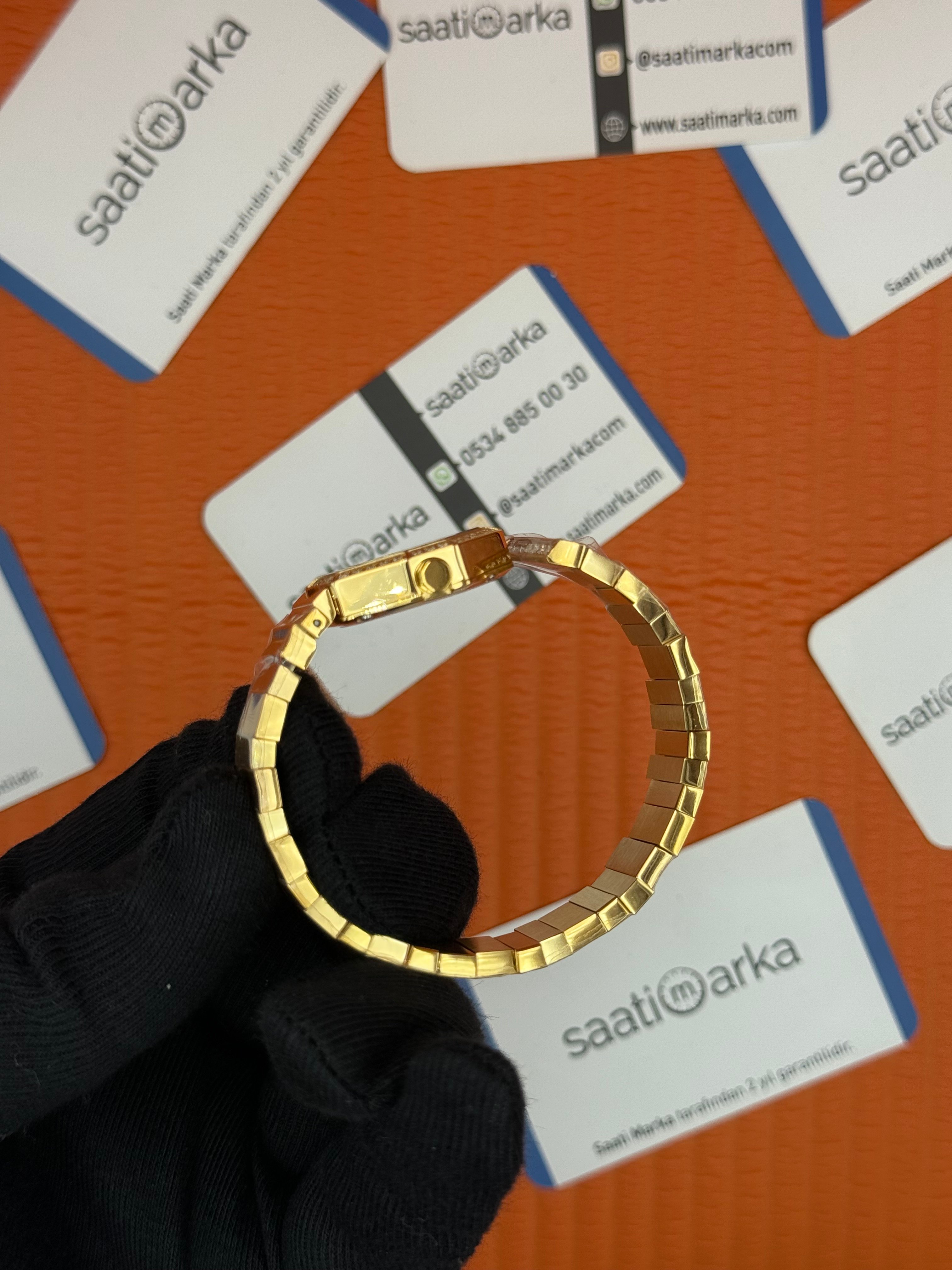 DİOR taşlı bezel yeşil kadran gold kasa kordon kadın kol saati