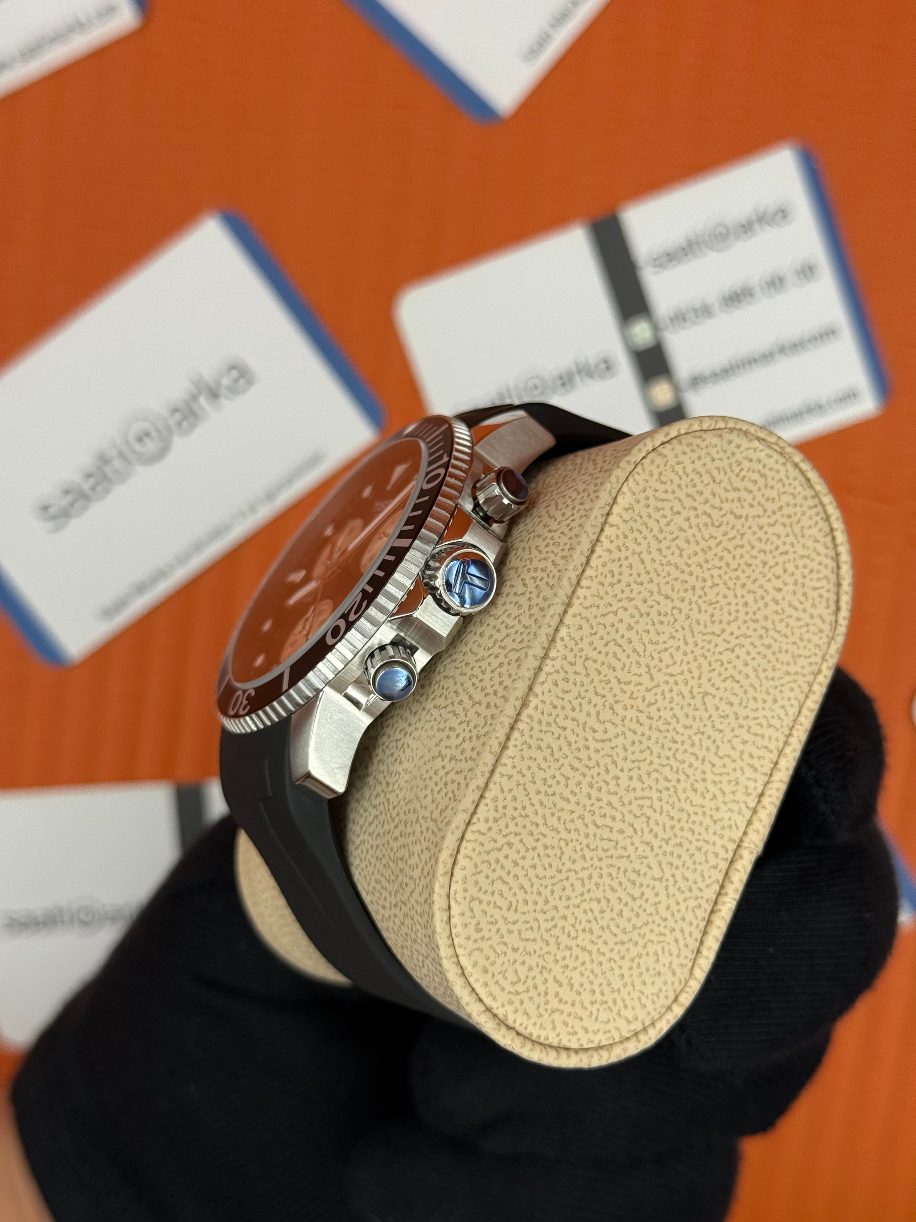 TISSOT siyah kauçuk kordon siyah kadran silver kasa erkek kol saati