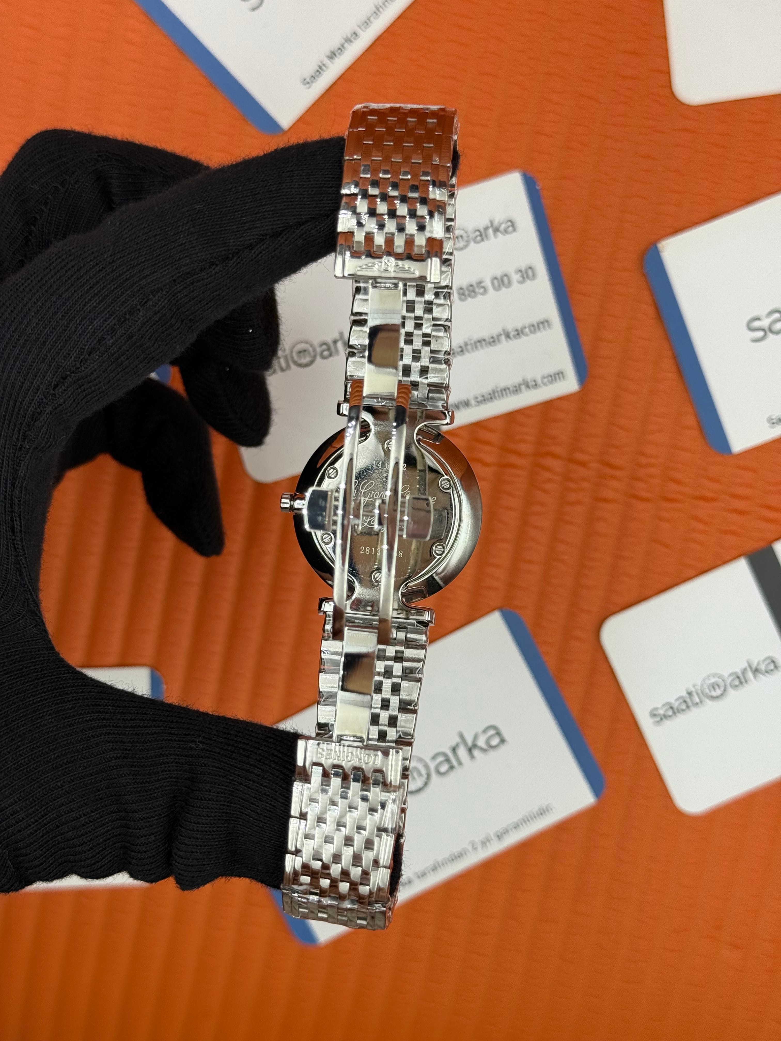 LONGINES taşlı bezel baget taşlı beyaz kadran silver kasa kordon