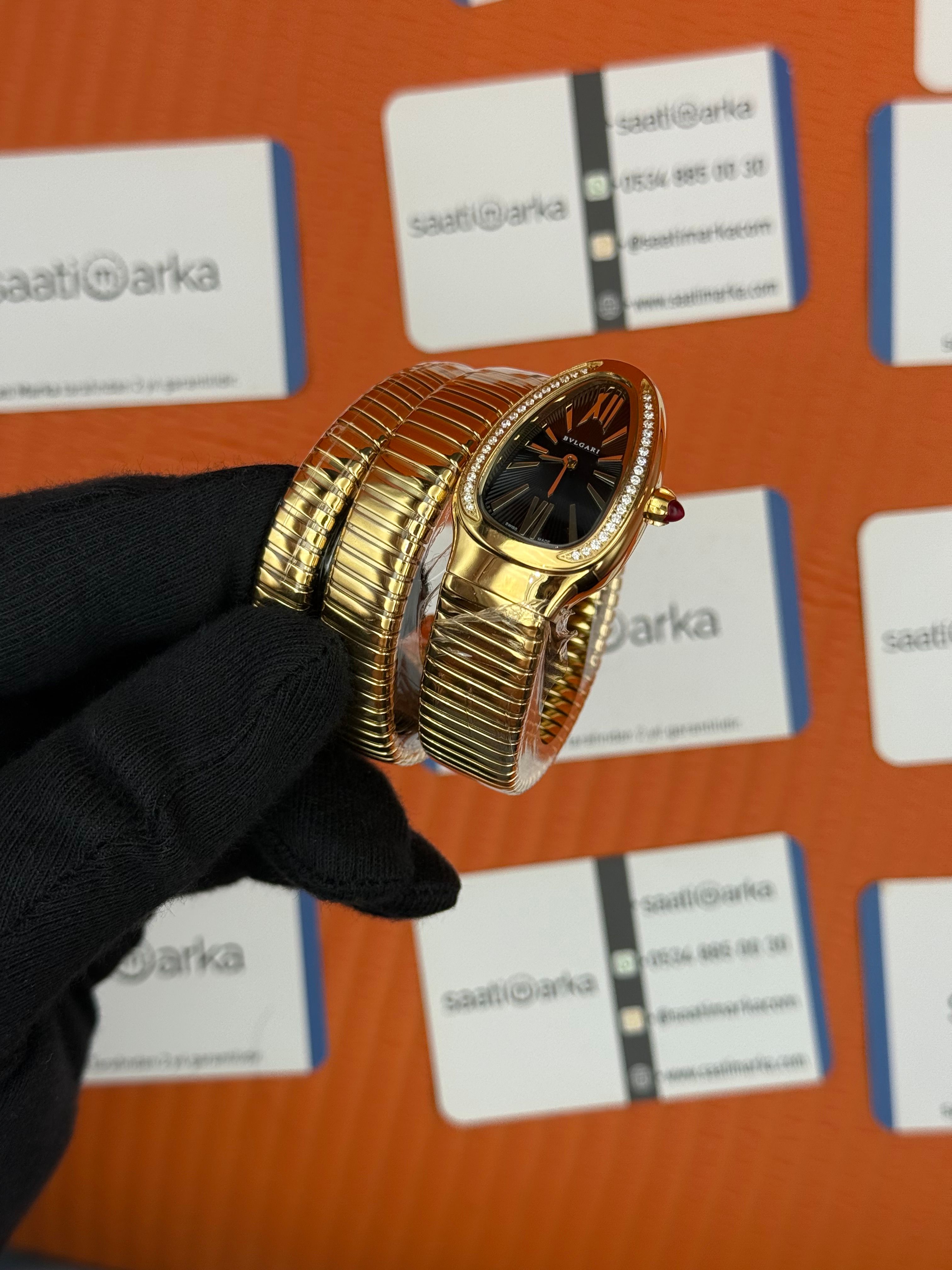 BVLGARİ serpenti çift sarma gold kordon taşlı bezel siyah kadran kadın kol saati