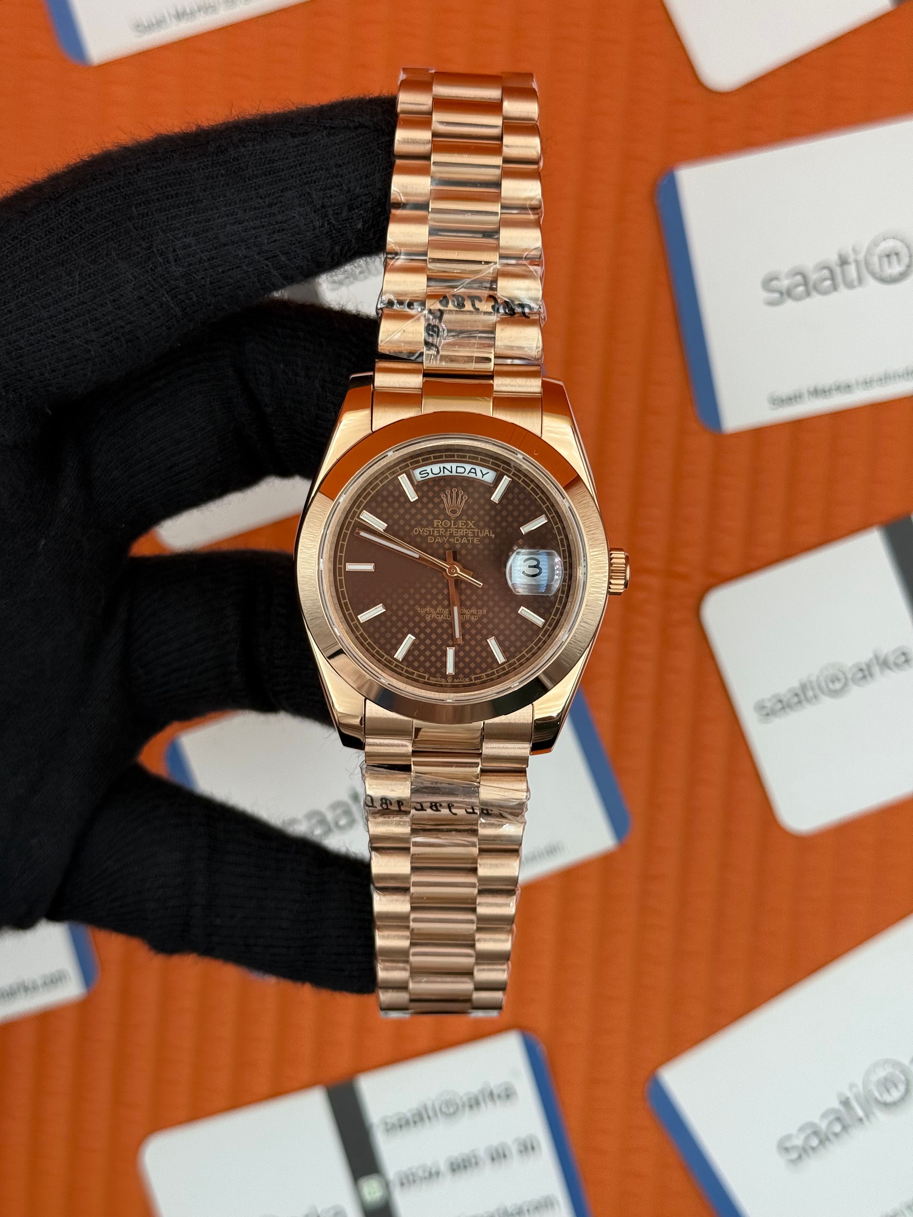 ROLEX Day Date kahverengi desenli kadran rose kasa-kordon oyster