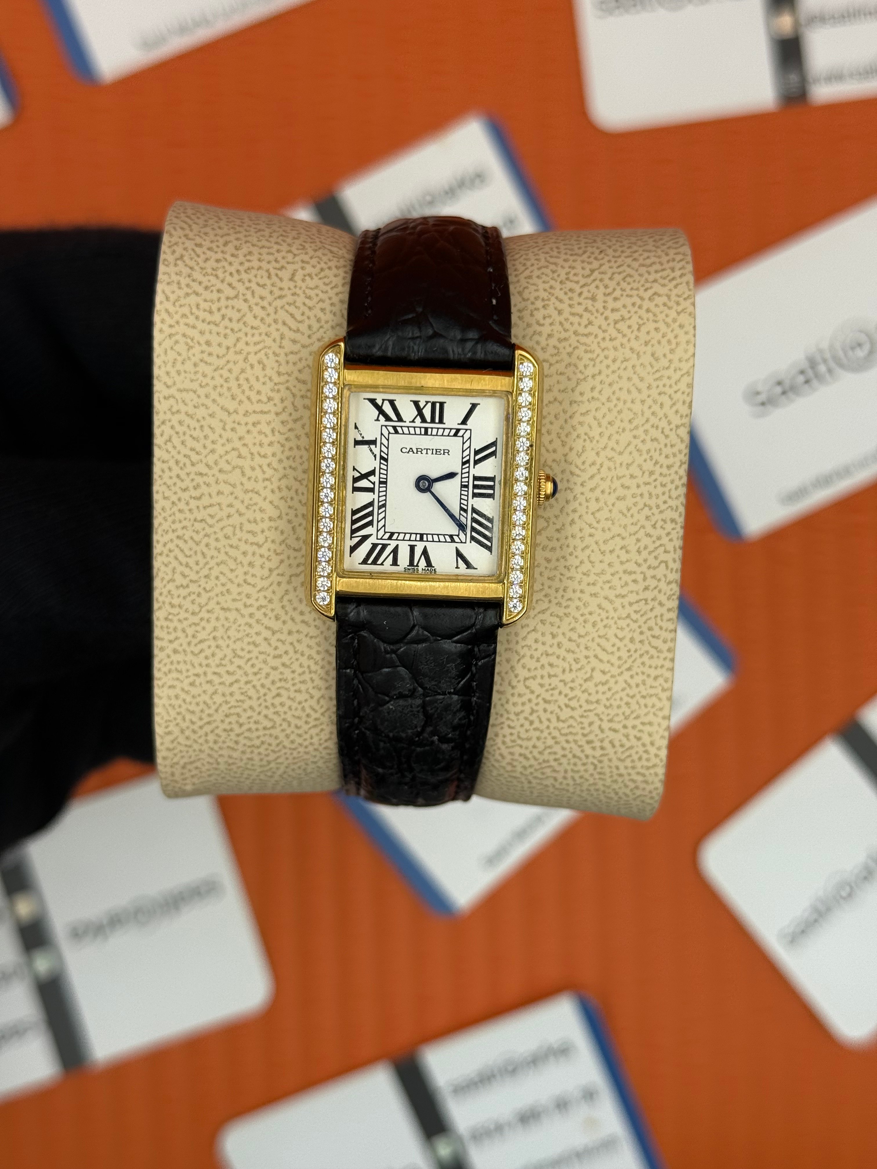 CARTIER Tank 29mm kadın kol saati gold kasa taşlı bezel siyah deri kordon