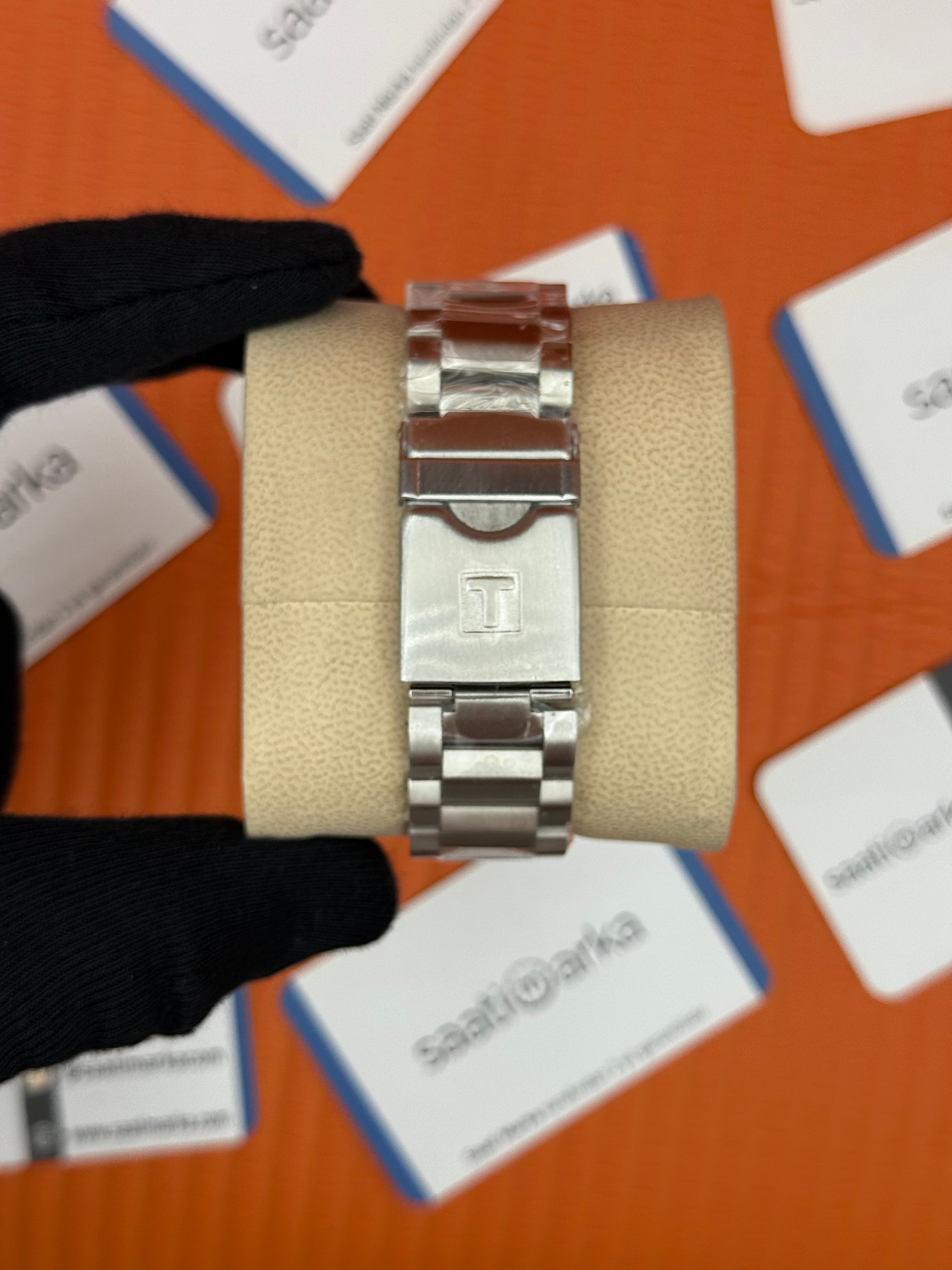 TISSOT mavi kadran silver kasa kordon erkek kol saati