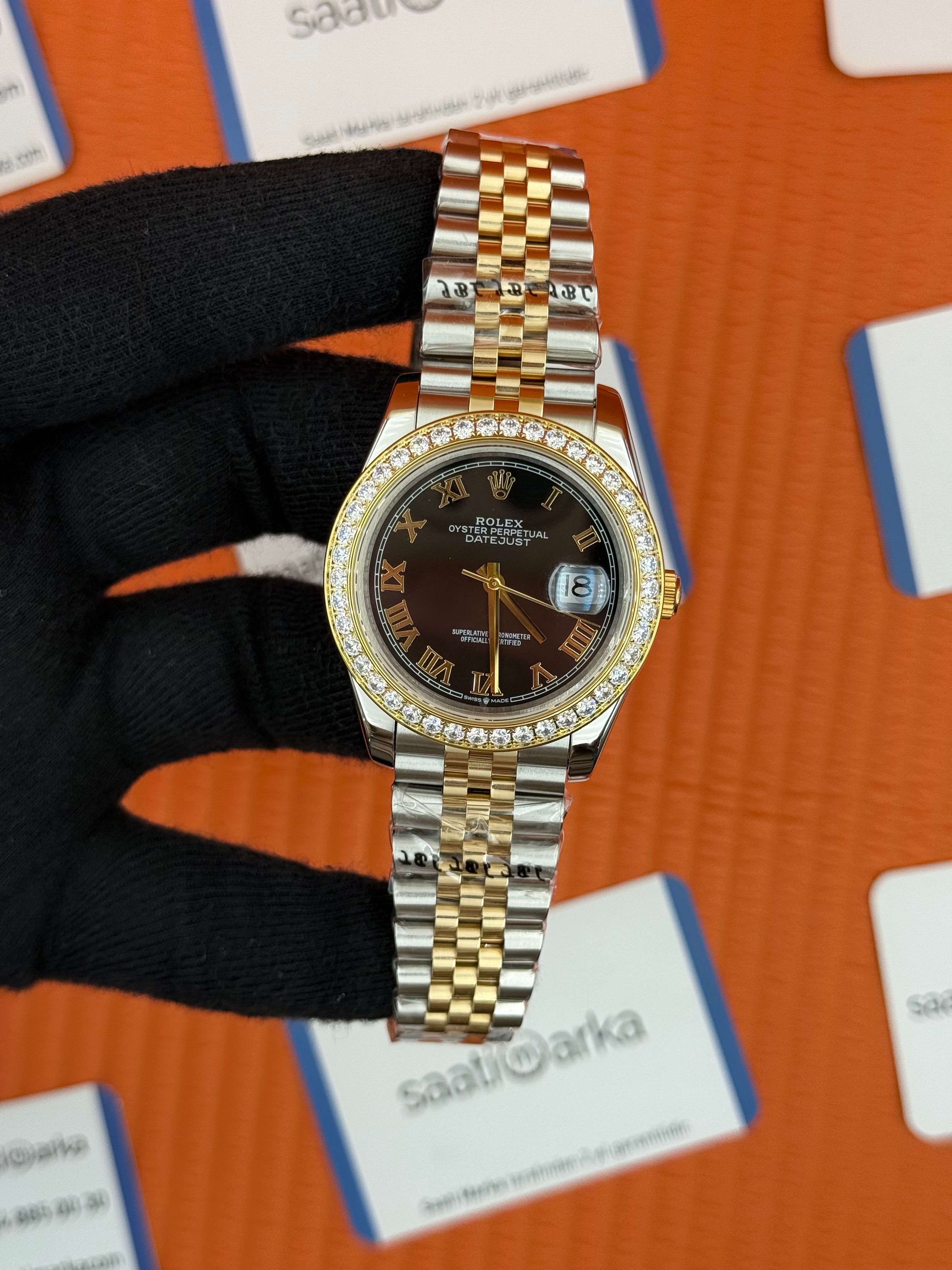 ROLEX Datejust taşlı bezel roma rakamlı black dial gold-silver jubilee kordon