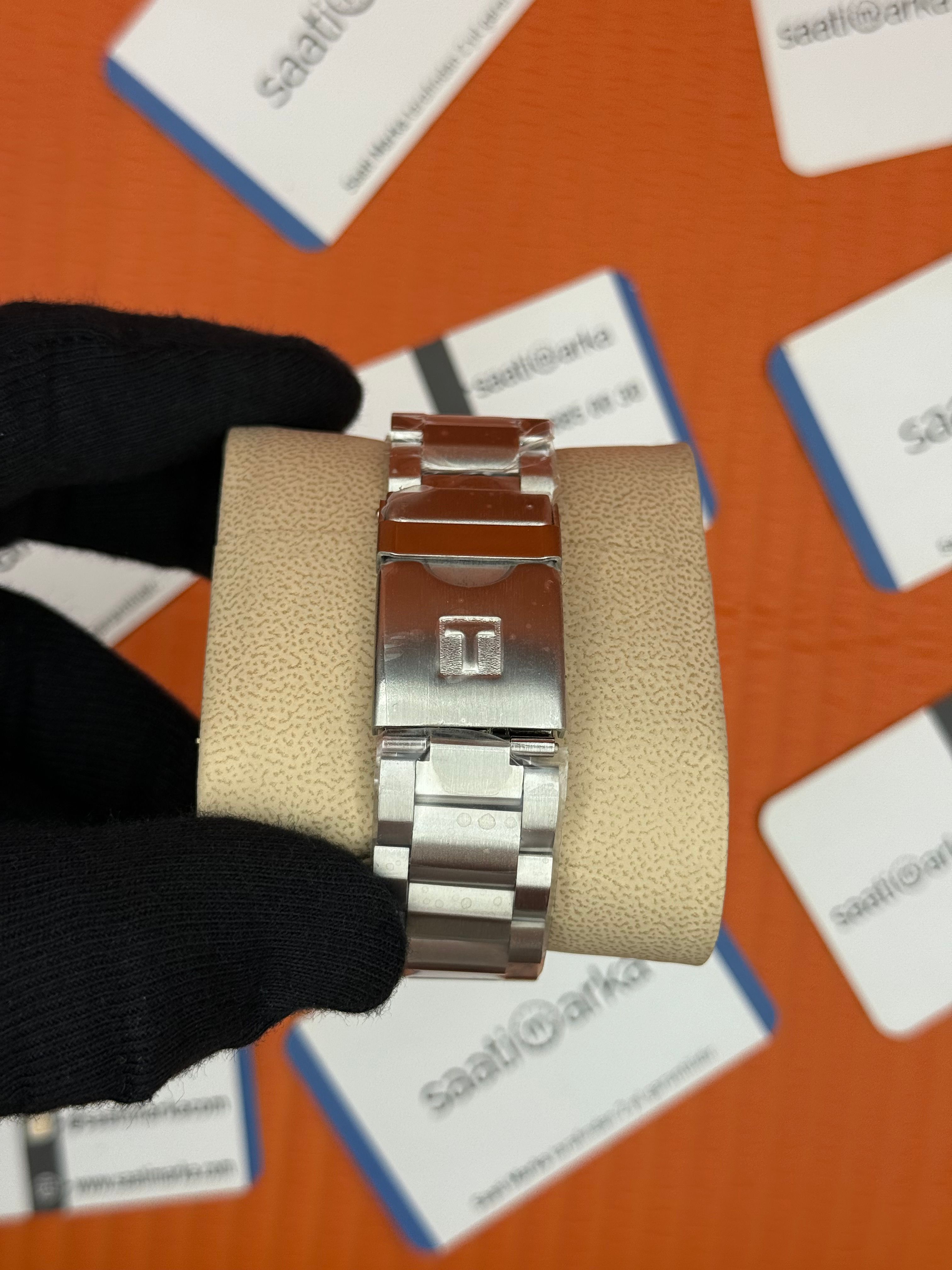 TISSOT siyah kadran silver kasa kordon erkek kol saati