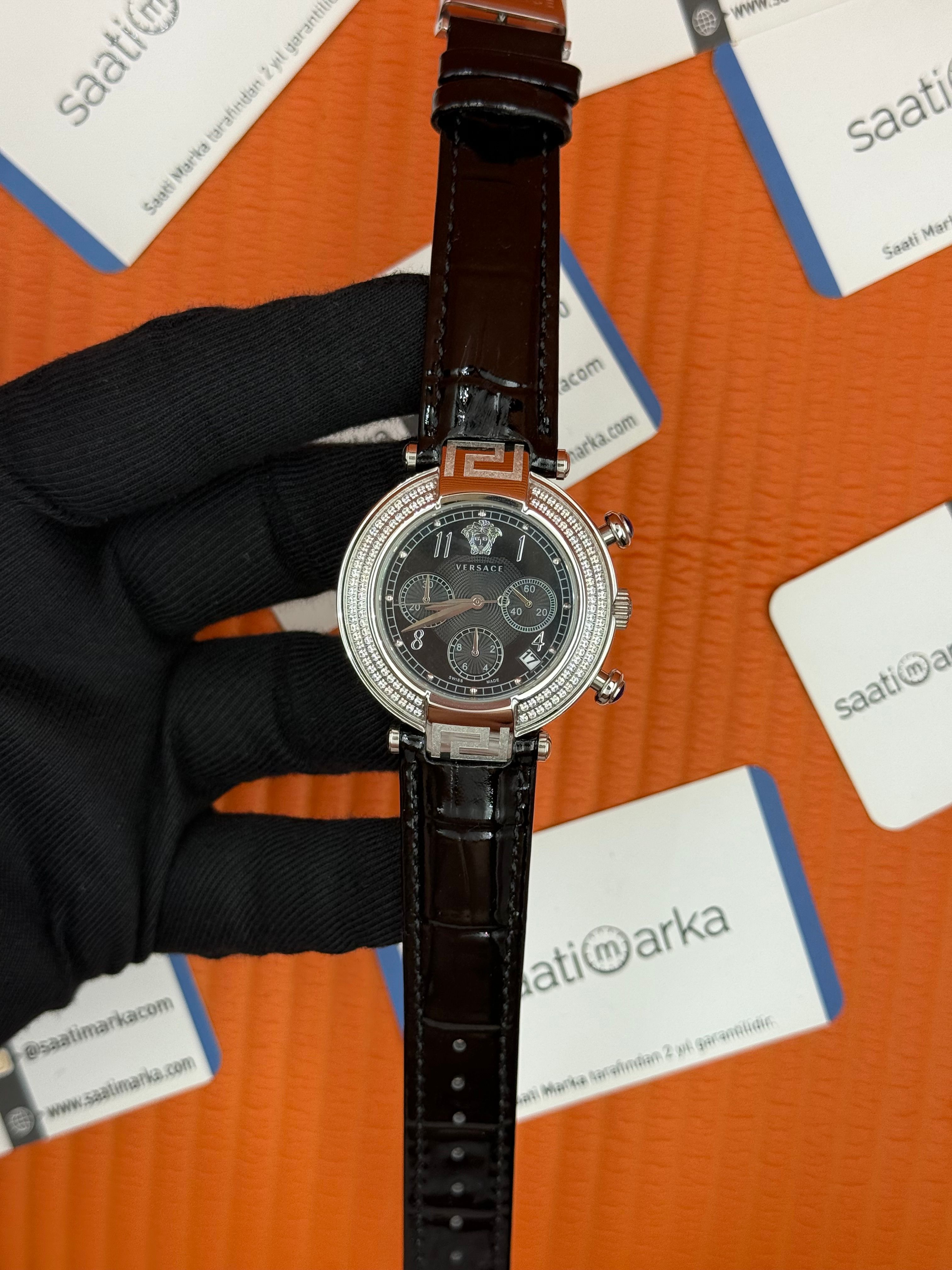 VERSACE taşlı bezel siyah kadran siyah deri kordon silver kasa kadın kol saati
