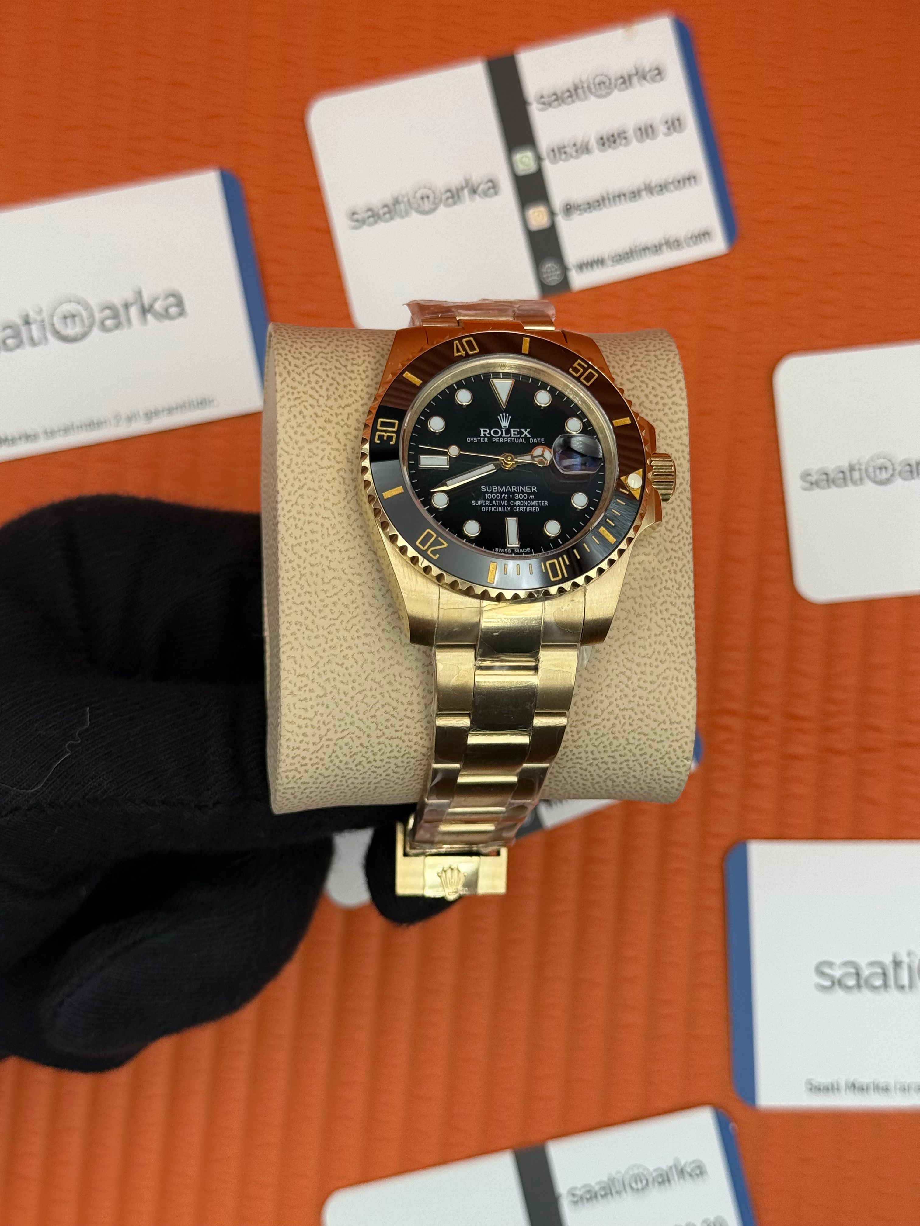 ROLEX Submariner oyster blacil dial gold kasa-kordon