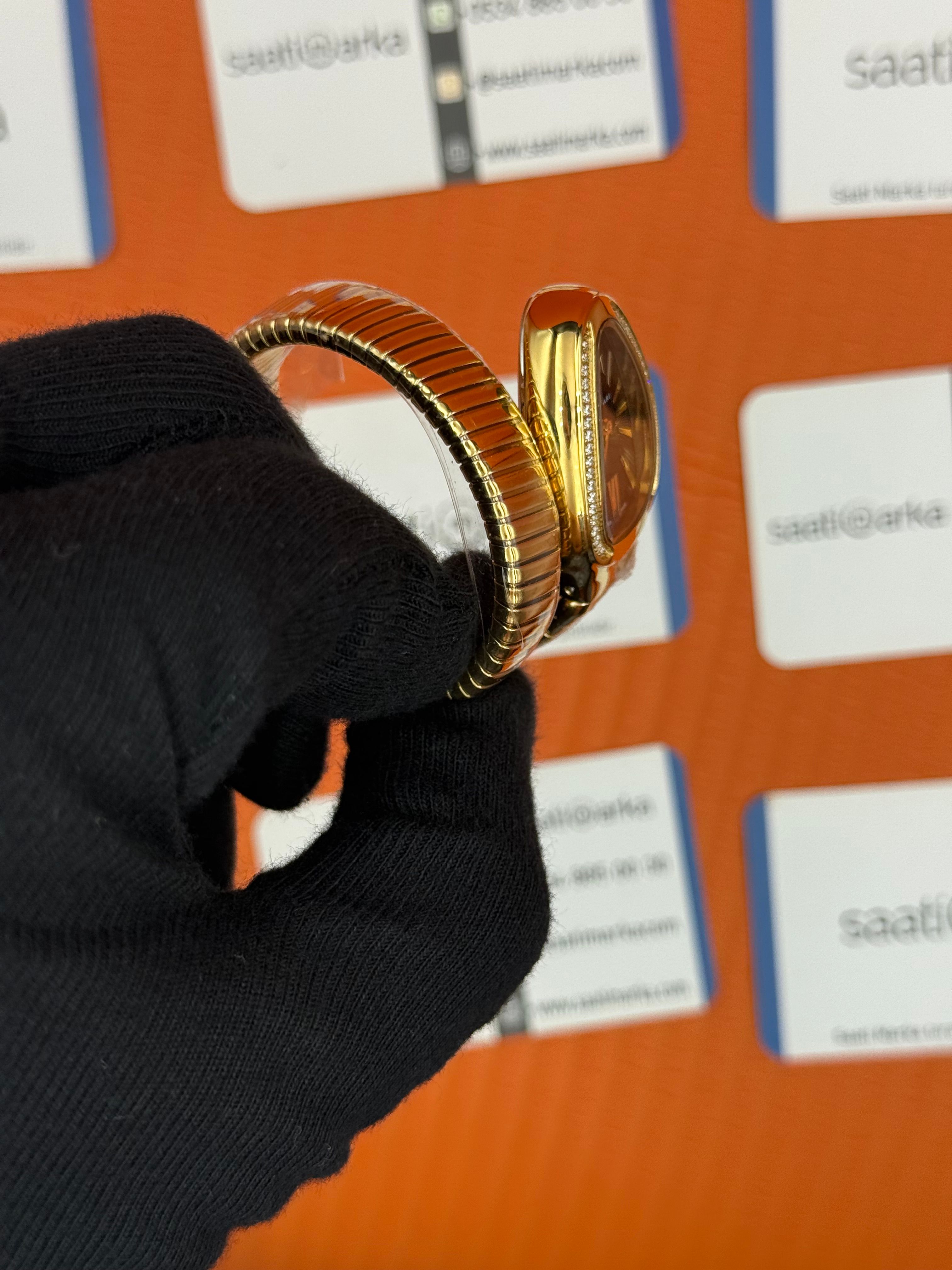 BVLGARİ serpenti tek sarma gold kordon taşlı bezel siyah kadran kadın kol saati