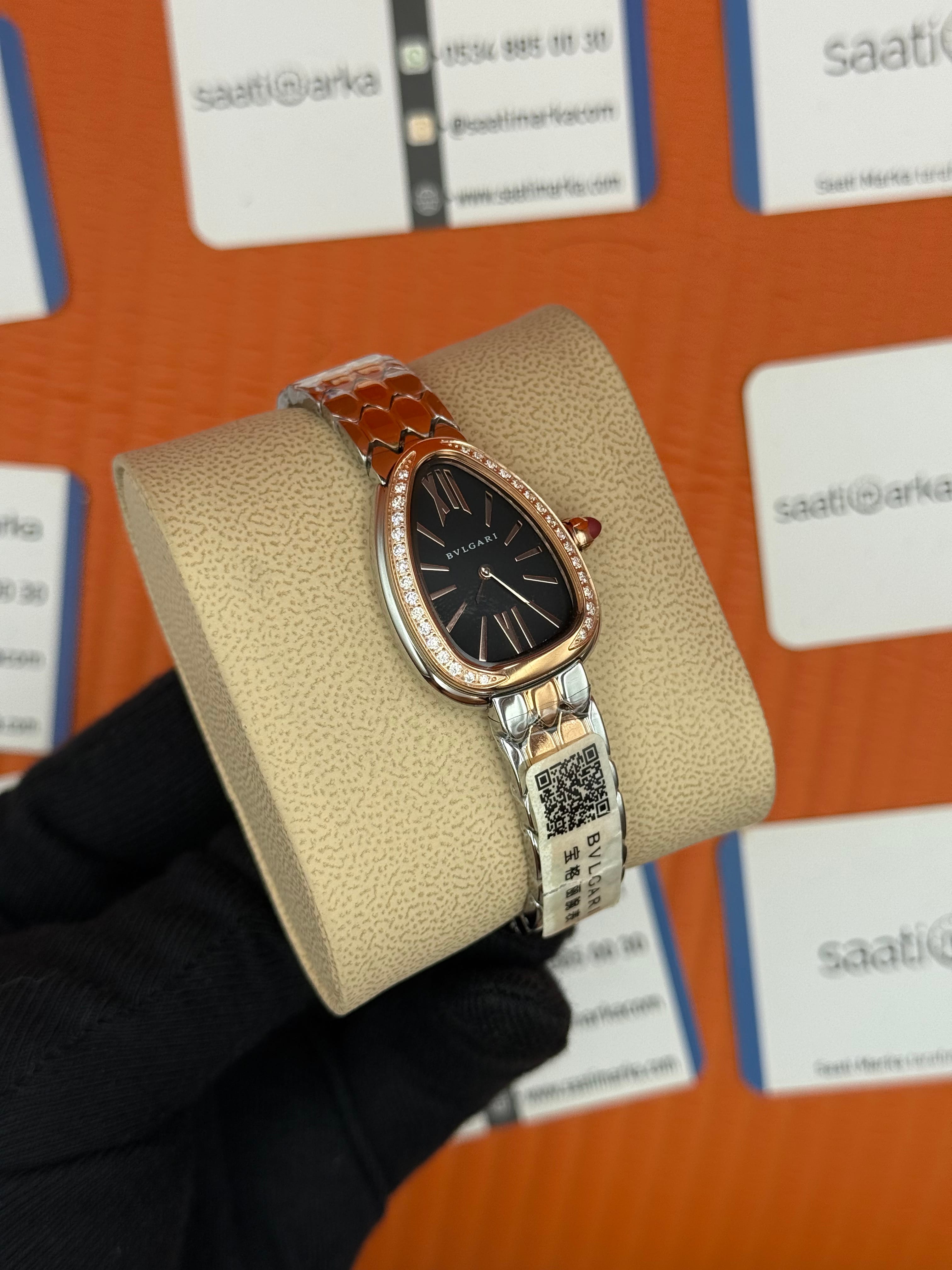 BVLGARİ serpenti seduttori taşlı bezel siyah kadran rose kasa kordon kadın kol saati