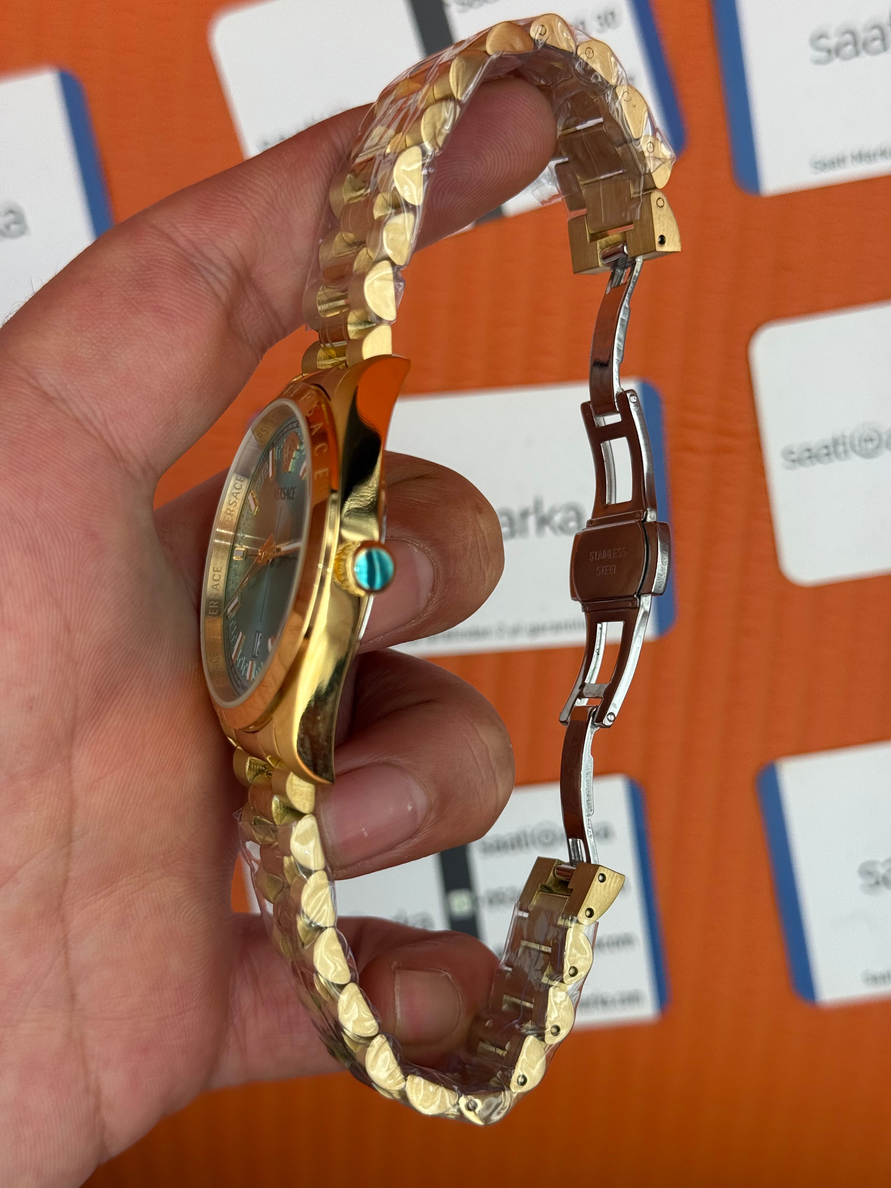 VERSACE 40mm turkuaz kadran gold kasa kordon erkek kol saati