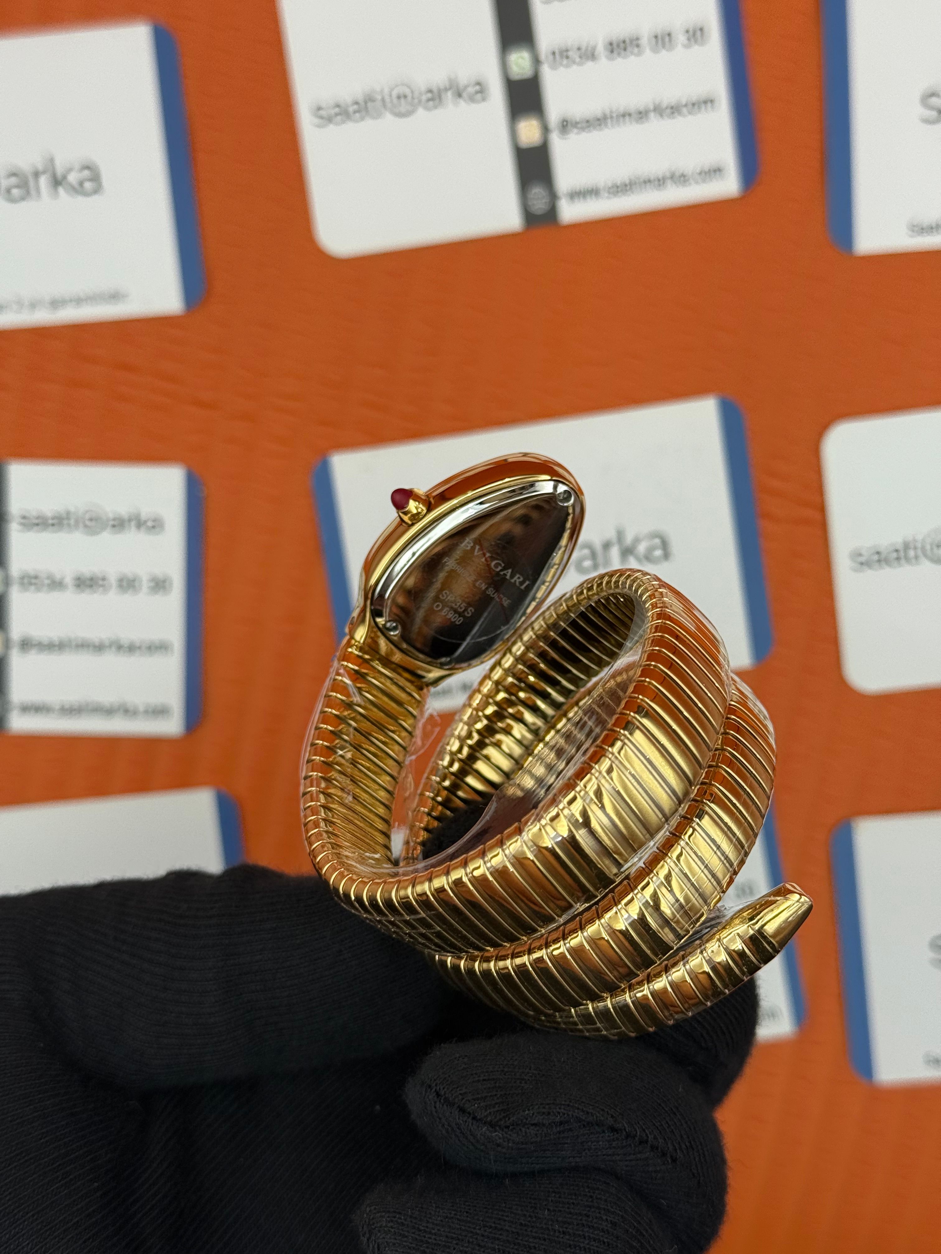 BVLGARİ serpenti çift sarma gold kordon taşlı bezel şampanya kadran kadın kol saati