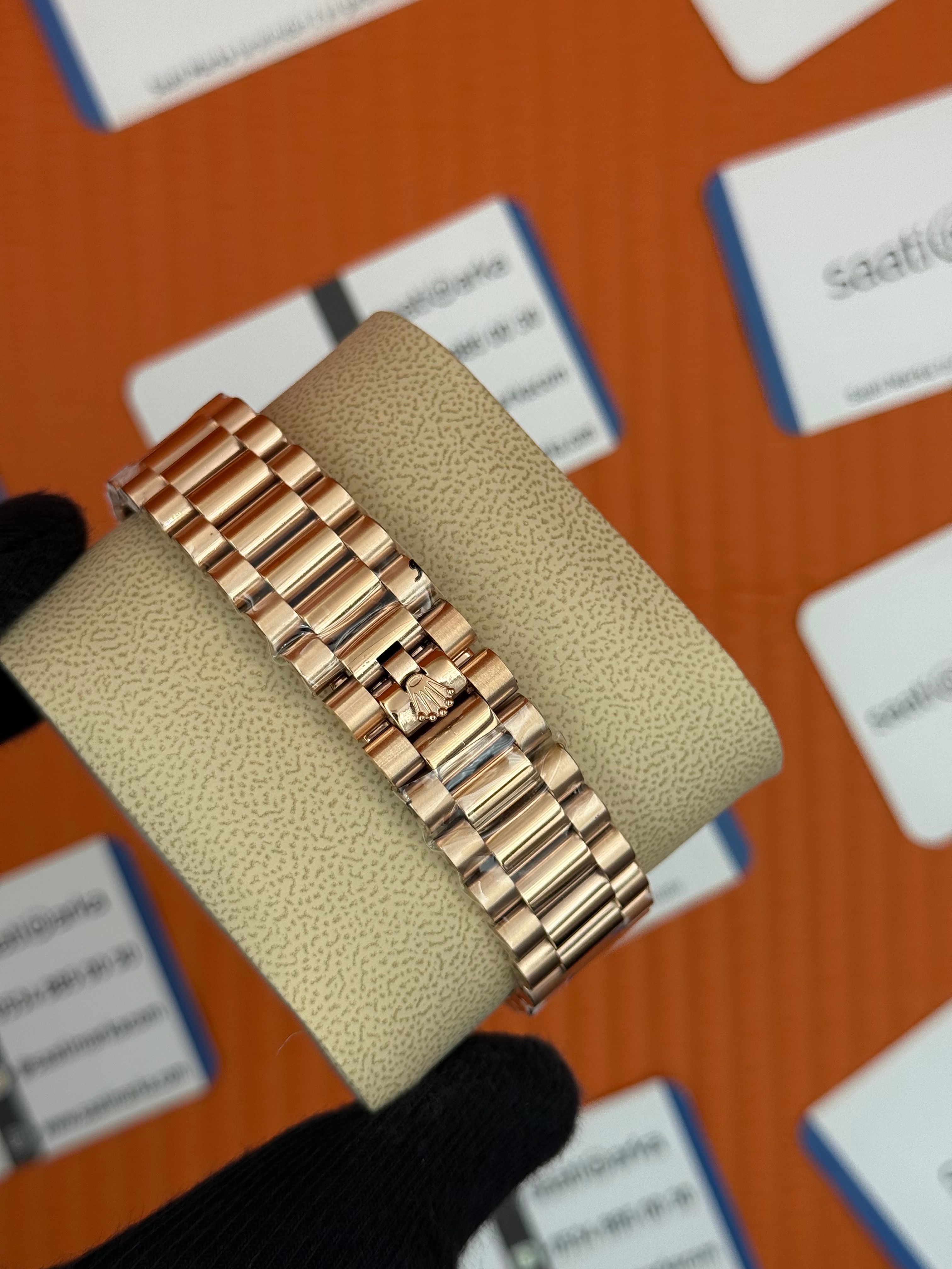 ROLEX Day Date taşlı bezel roma rakamlı siyah kadran rose kasa-kordon oyster