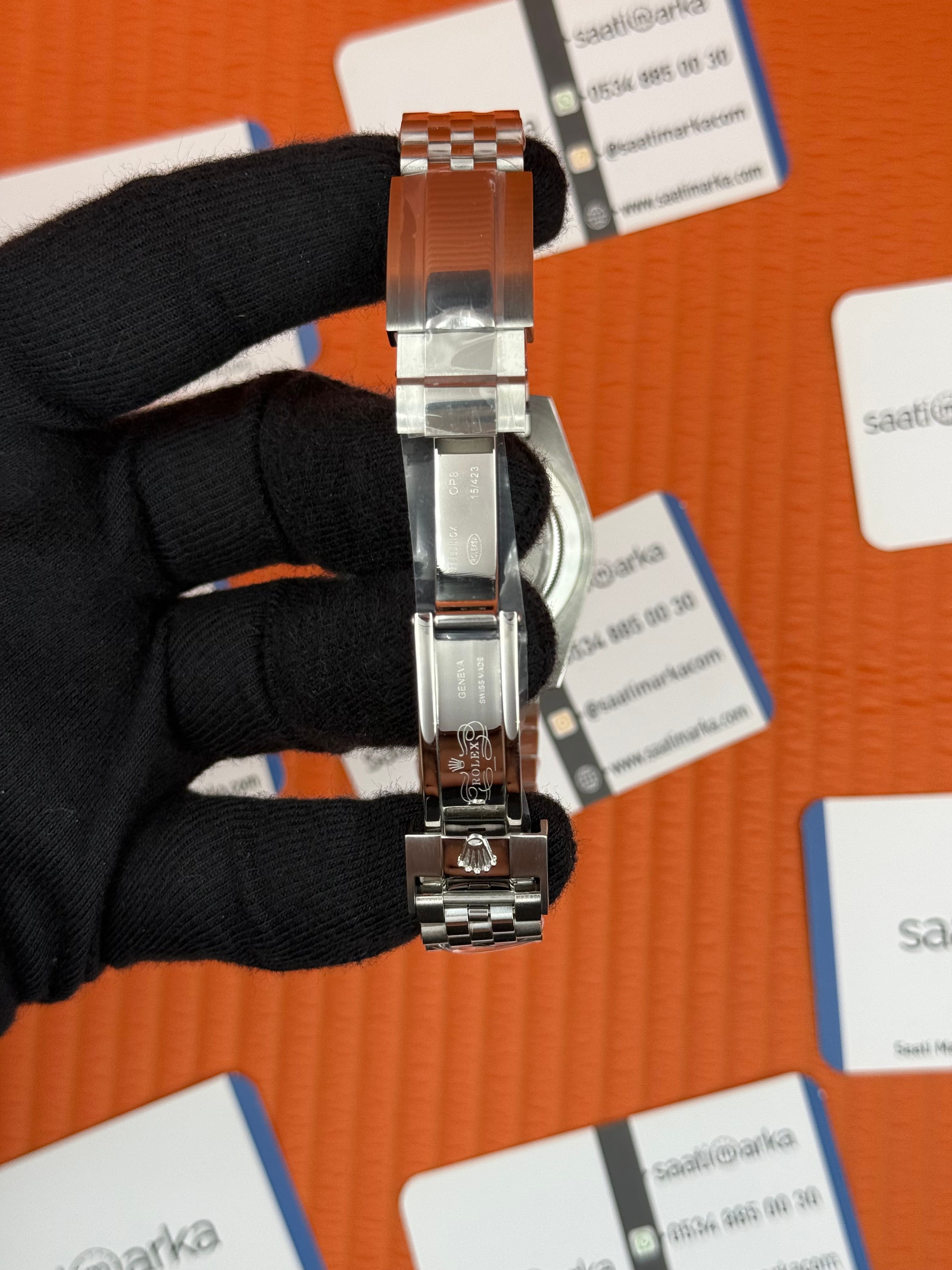 ROLEX Submariner jubilee silver kordon black bezel dial 