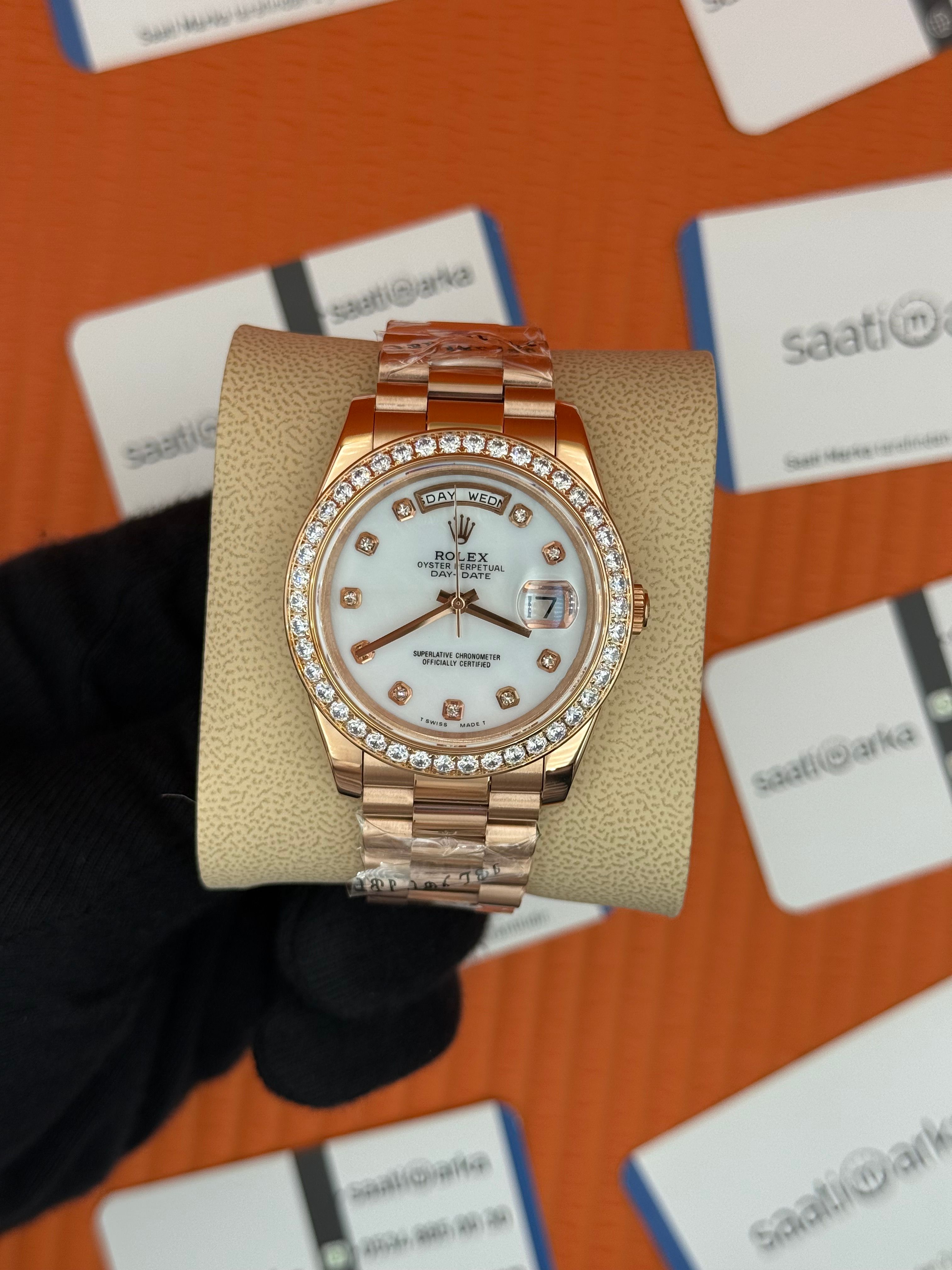 ROLEX Day Date baget taşlı beyaz kadran rose kasa-kordon oyster