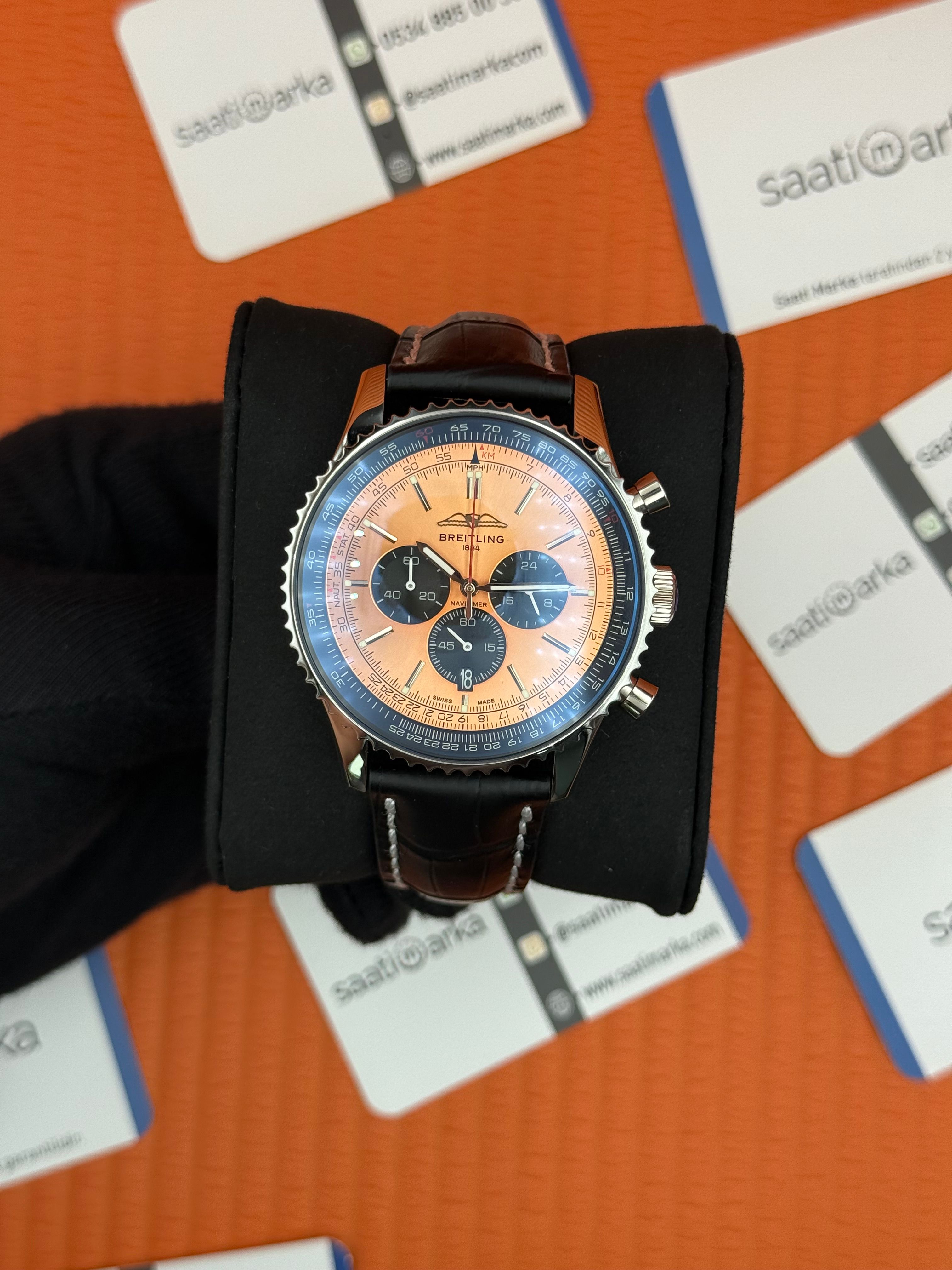 BREITLING Navitimer siyah deri kordon turuncu kadran çelik kasa 