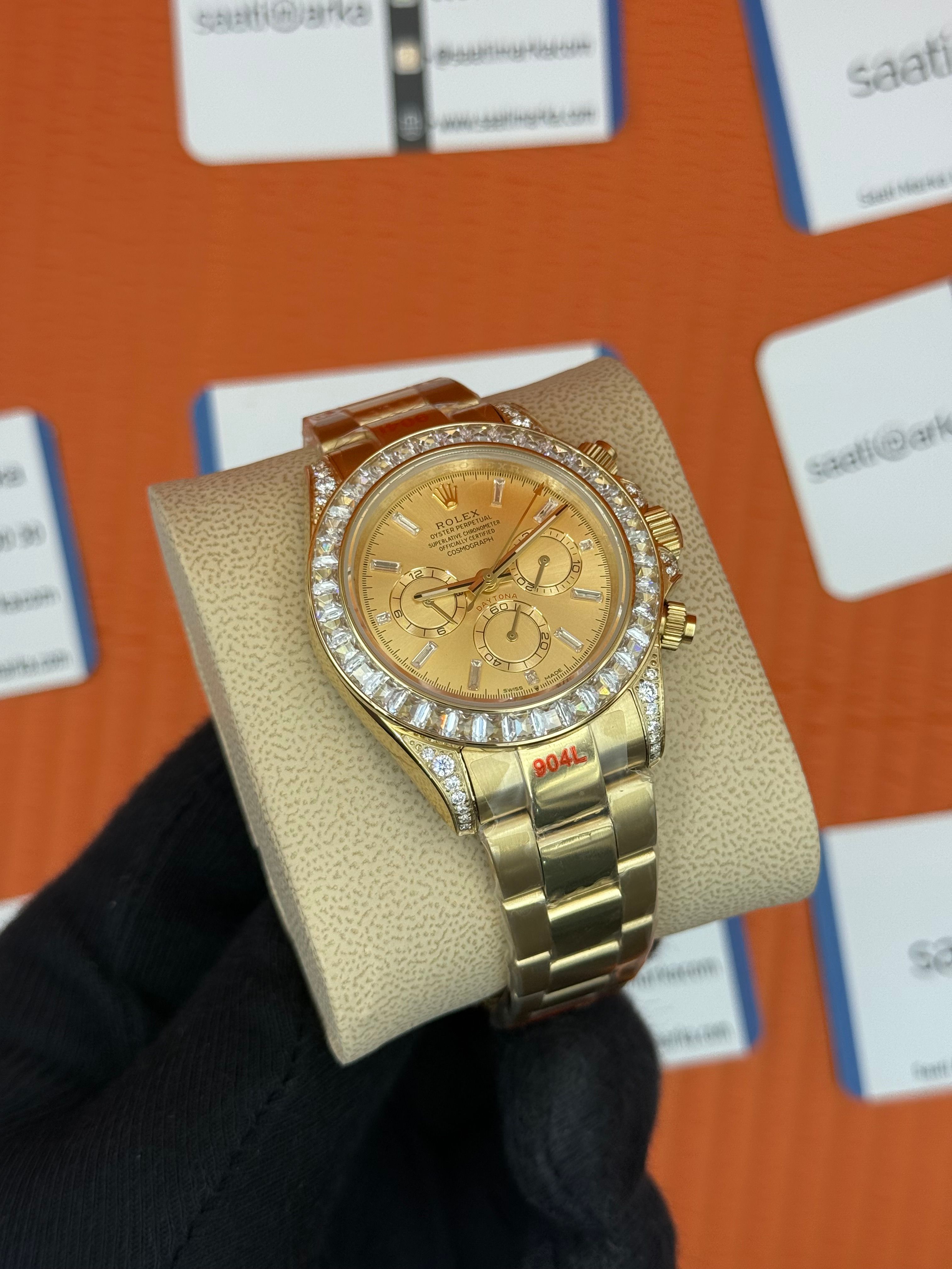 ROLEX Daytona taşlı bezel champagne dial gold kasa-kordon