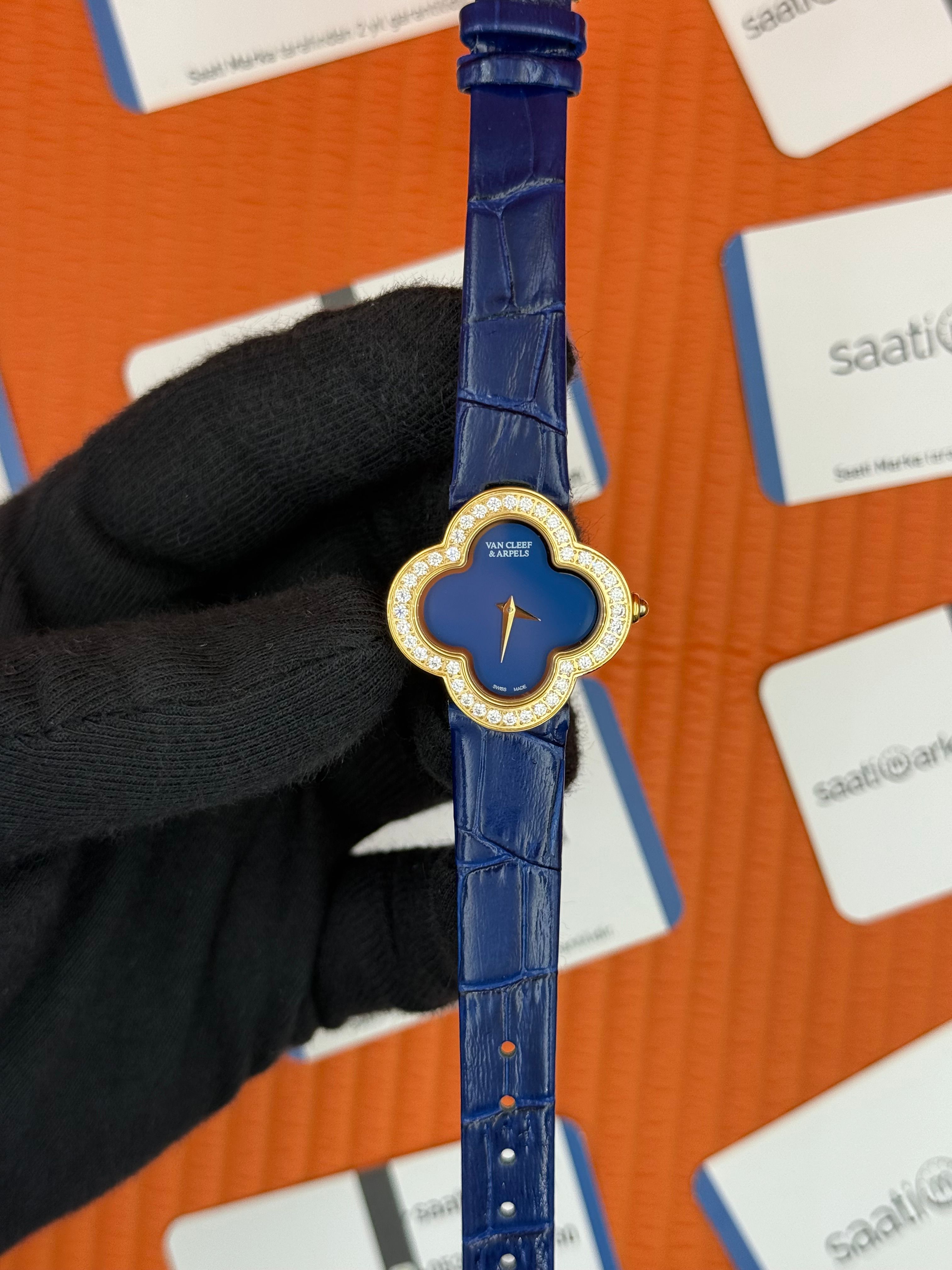 VAN CLEEF lacivert kadran lacivert deri kordon gold kasa taşlı bezel kadın kol saati