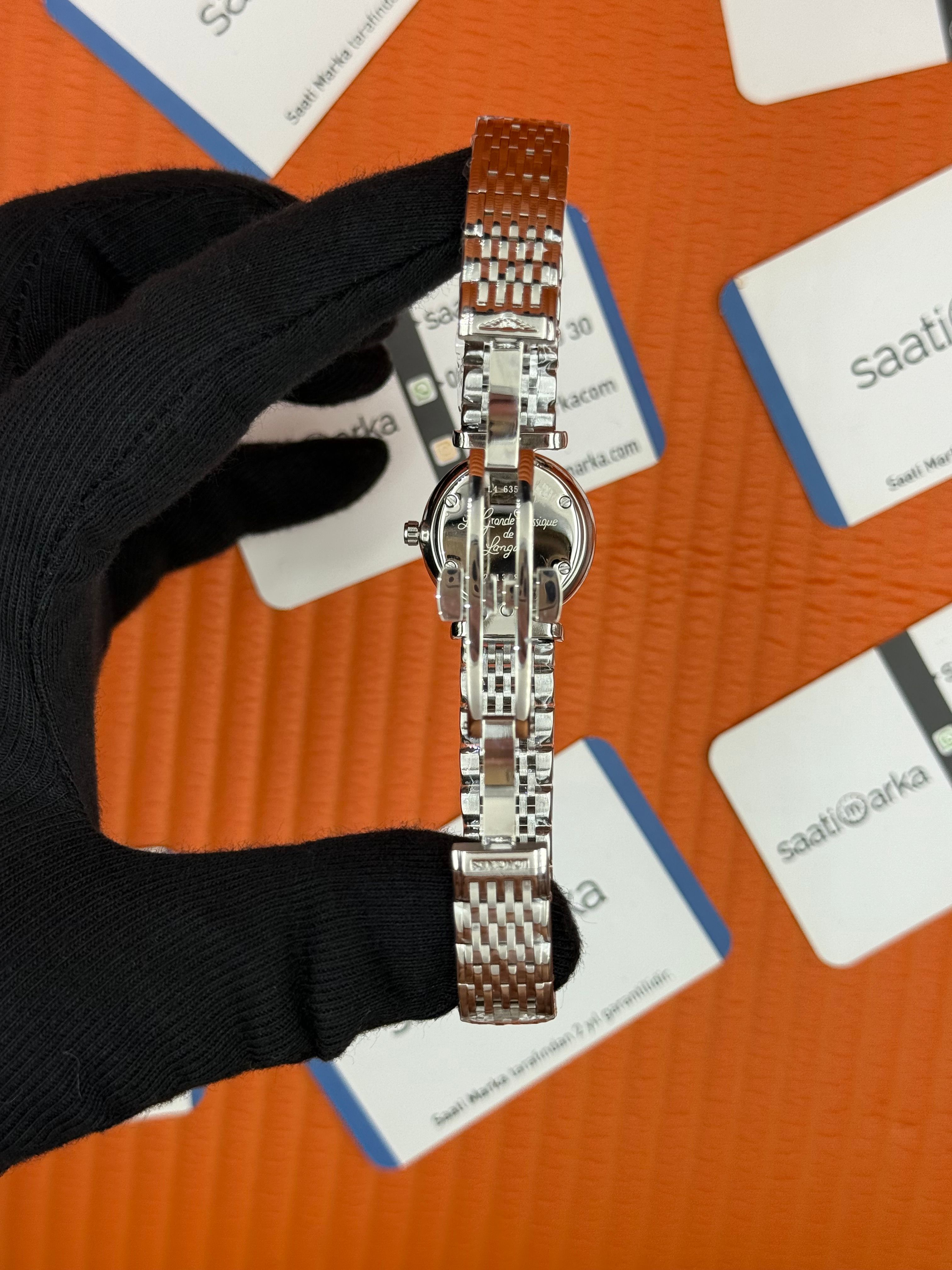 LONGINES L42094116 beyaz baget taşlı kadran silver kasa kordon
