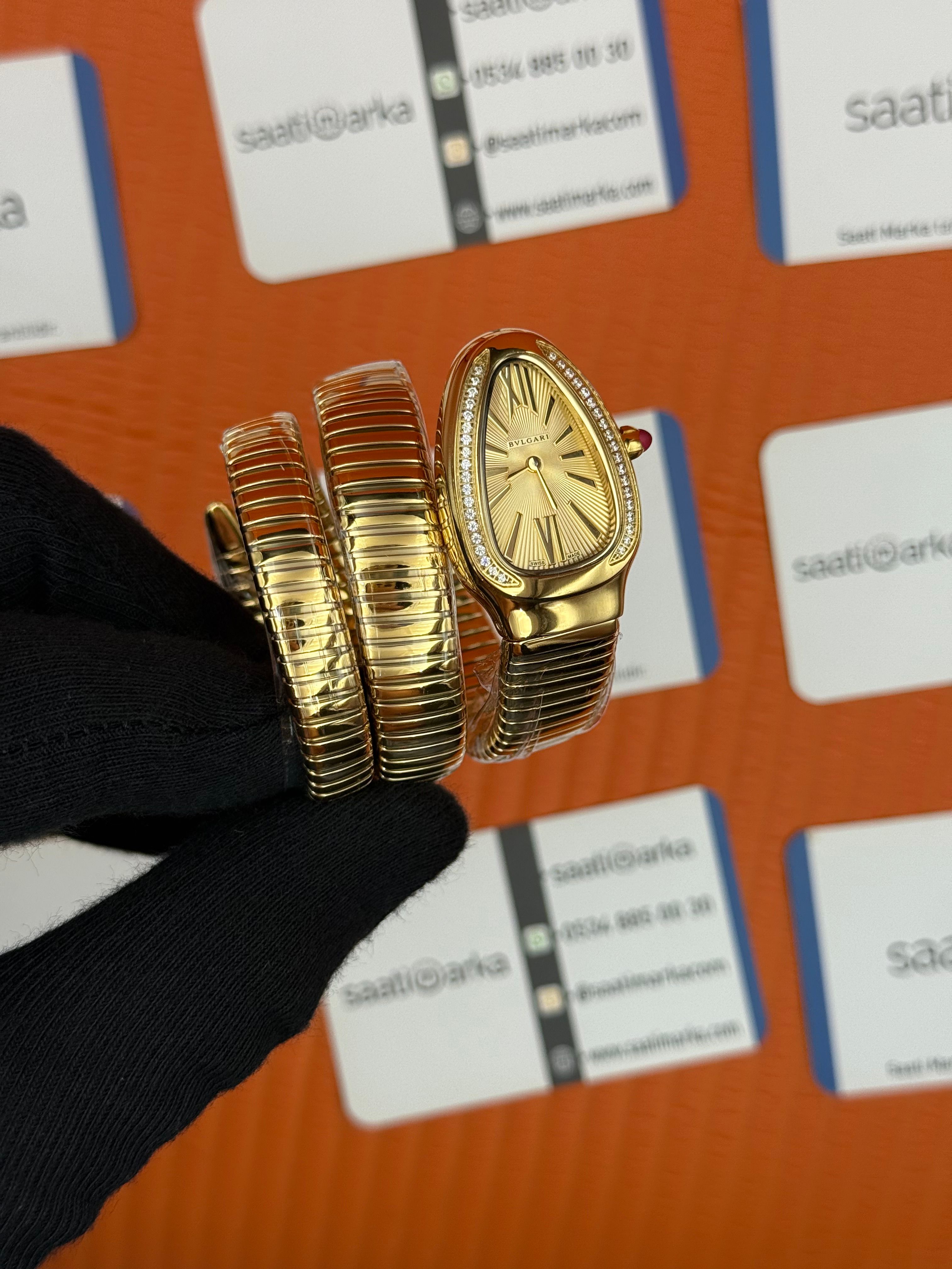 BVLGARİ serpenti çift sarma gold kordon taşlı bezel şampanya kadran kadın kol saati