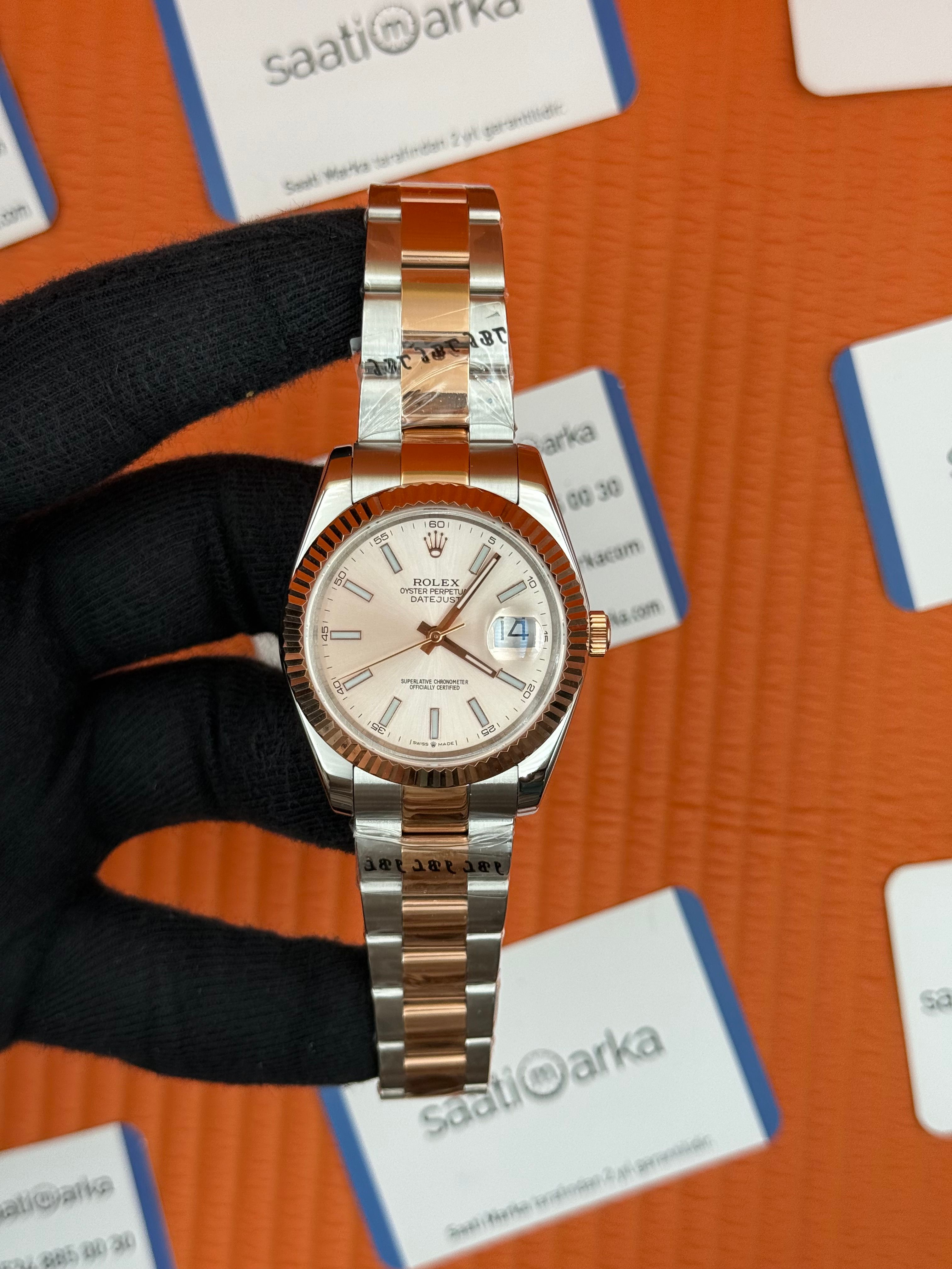 ROLEX Datejust rose dial rose-silver oyster kordon