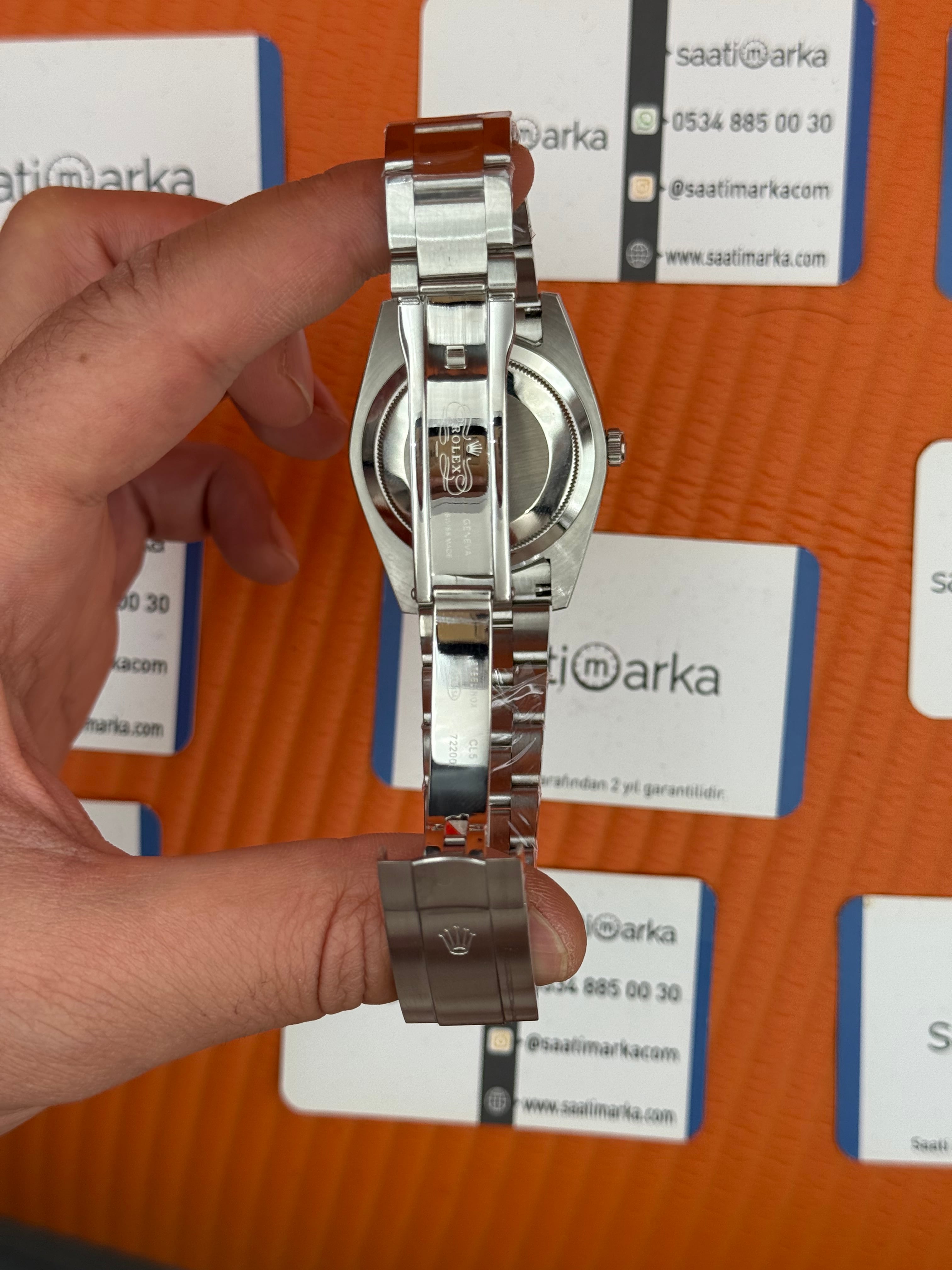 ROLEX oyster perpetual kırmızı kadran silver kasa kordon erkek kol saati
