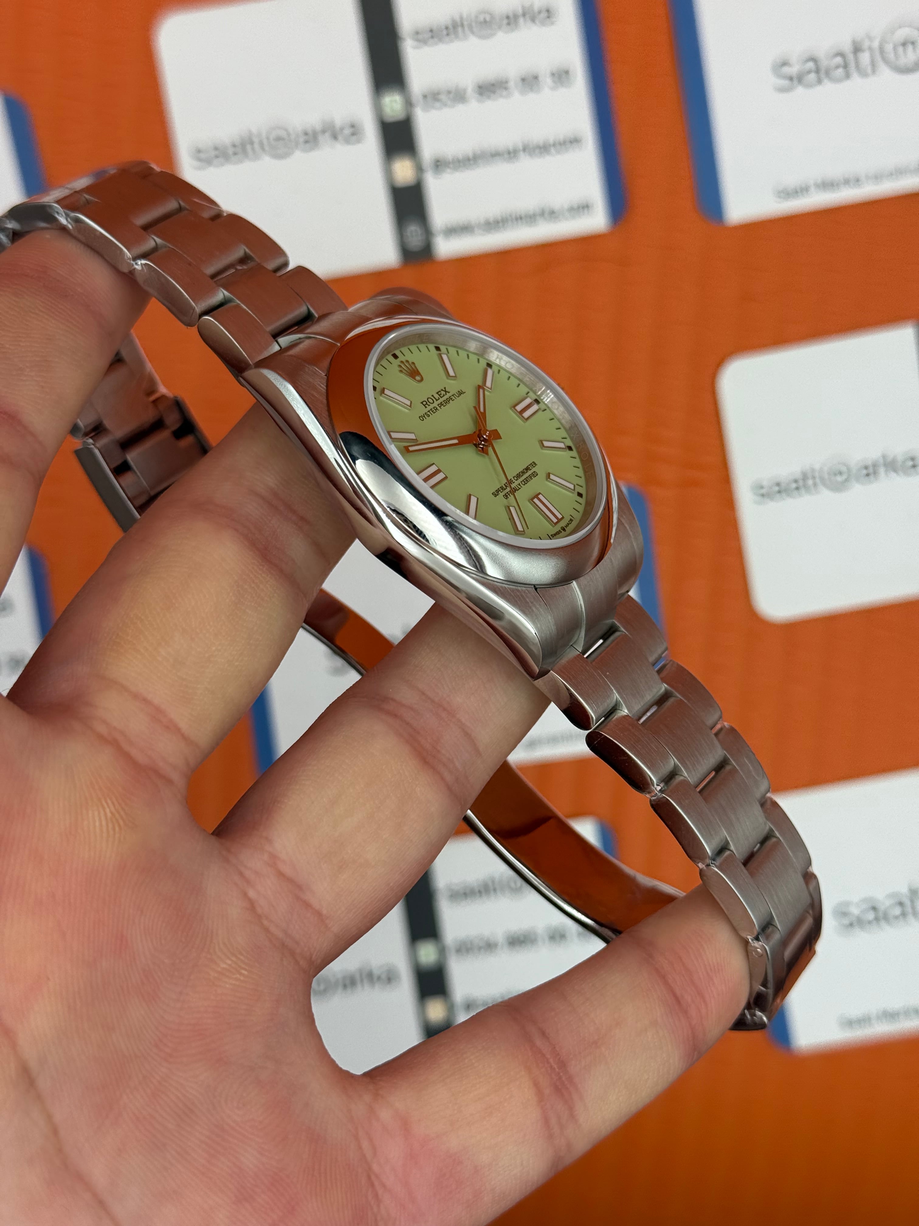 ROLEX oyster perpetual fıstık yeşili kadran silver kasa kordon erkek kol saati