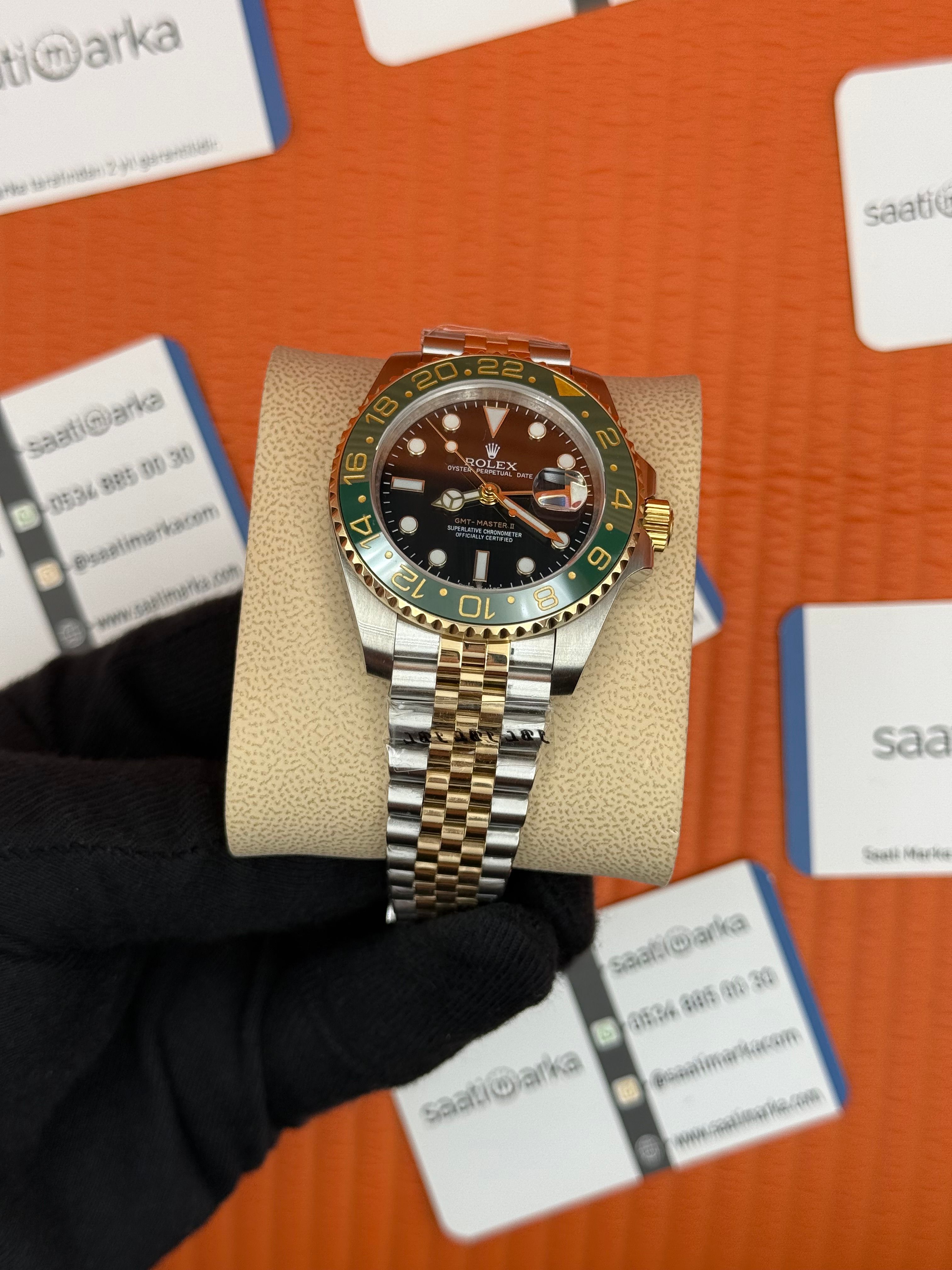 ROLEX Gmt Master black dial green bezel jubilee gold silver kordon 40mm